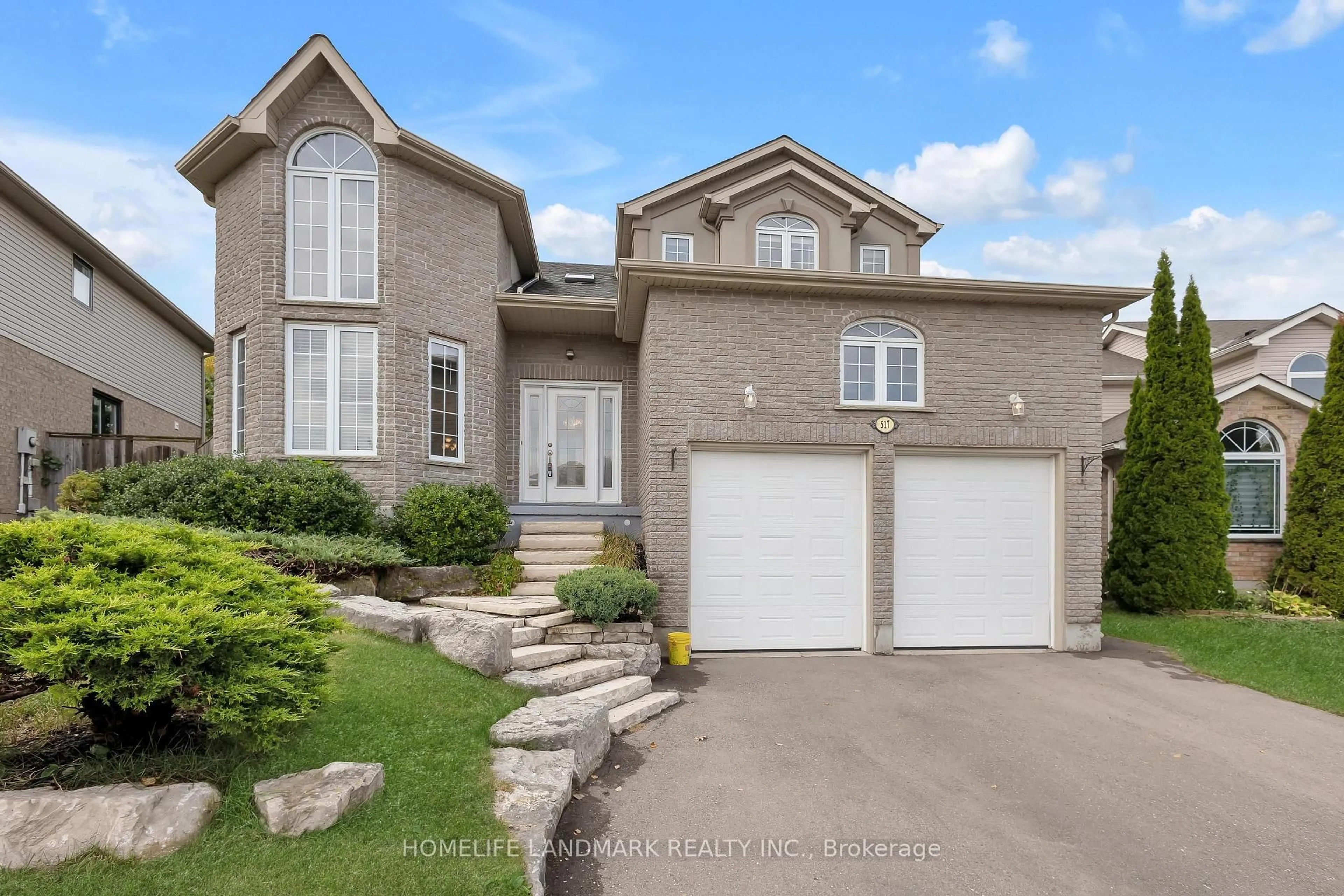 Home with brick exterior material, street for 517 Yorkshire Dr, Waterloo Ontario N2T 2V1