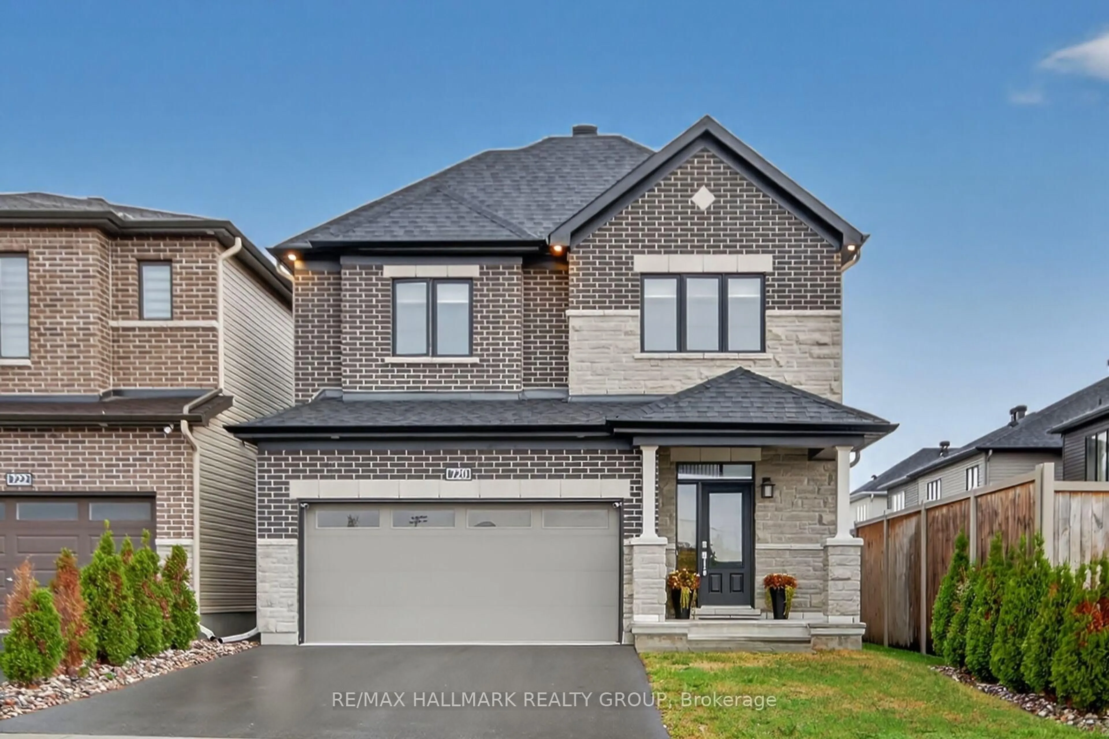 Home with brick exterior material, street for 720 Cappamore Dr, Ottawa Ontario K2J 6W3