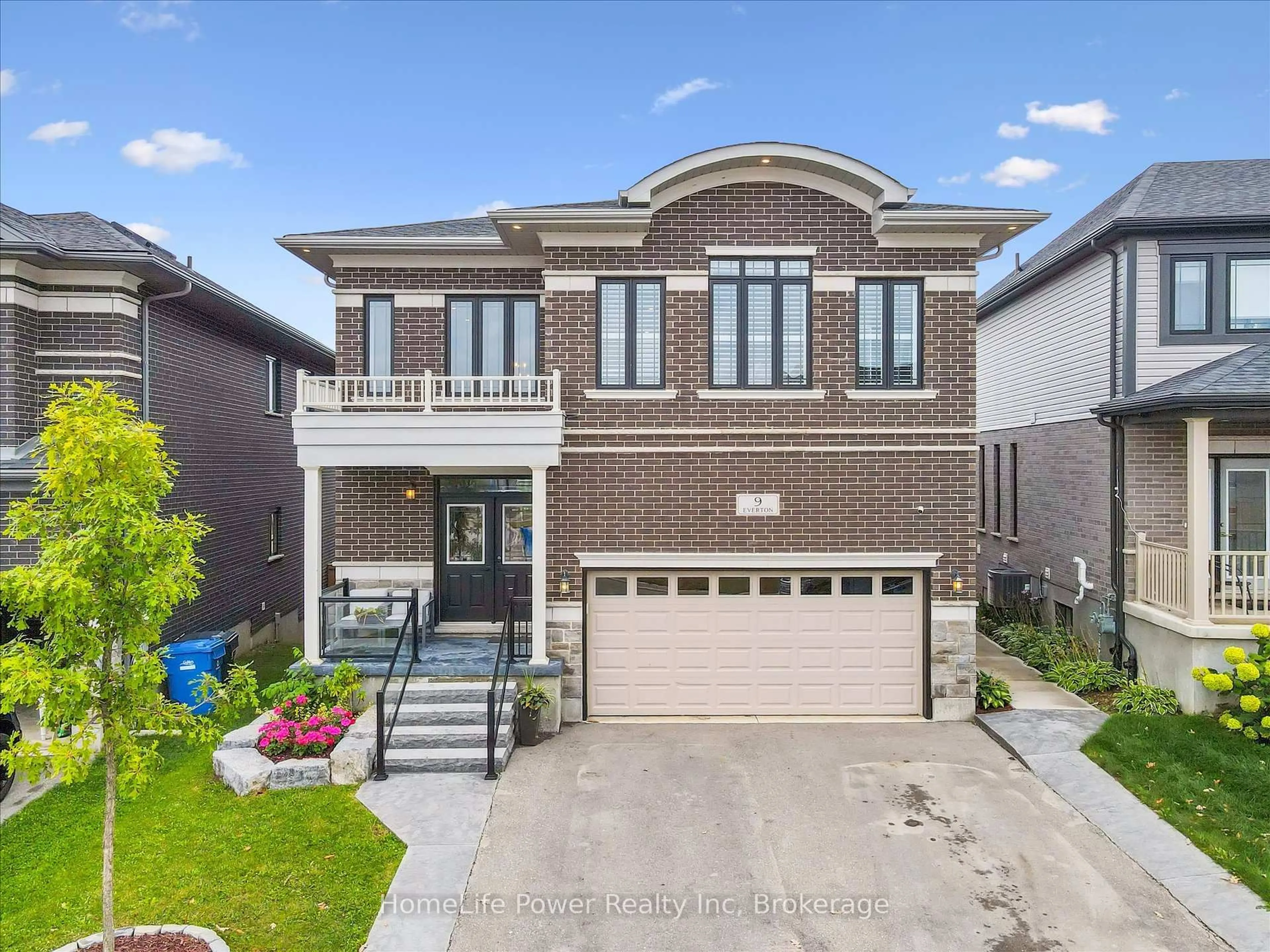 Home with brick exterior material, street for 9 Everton Dr, Guelph Ontario N1E 0R9