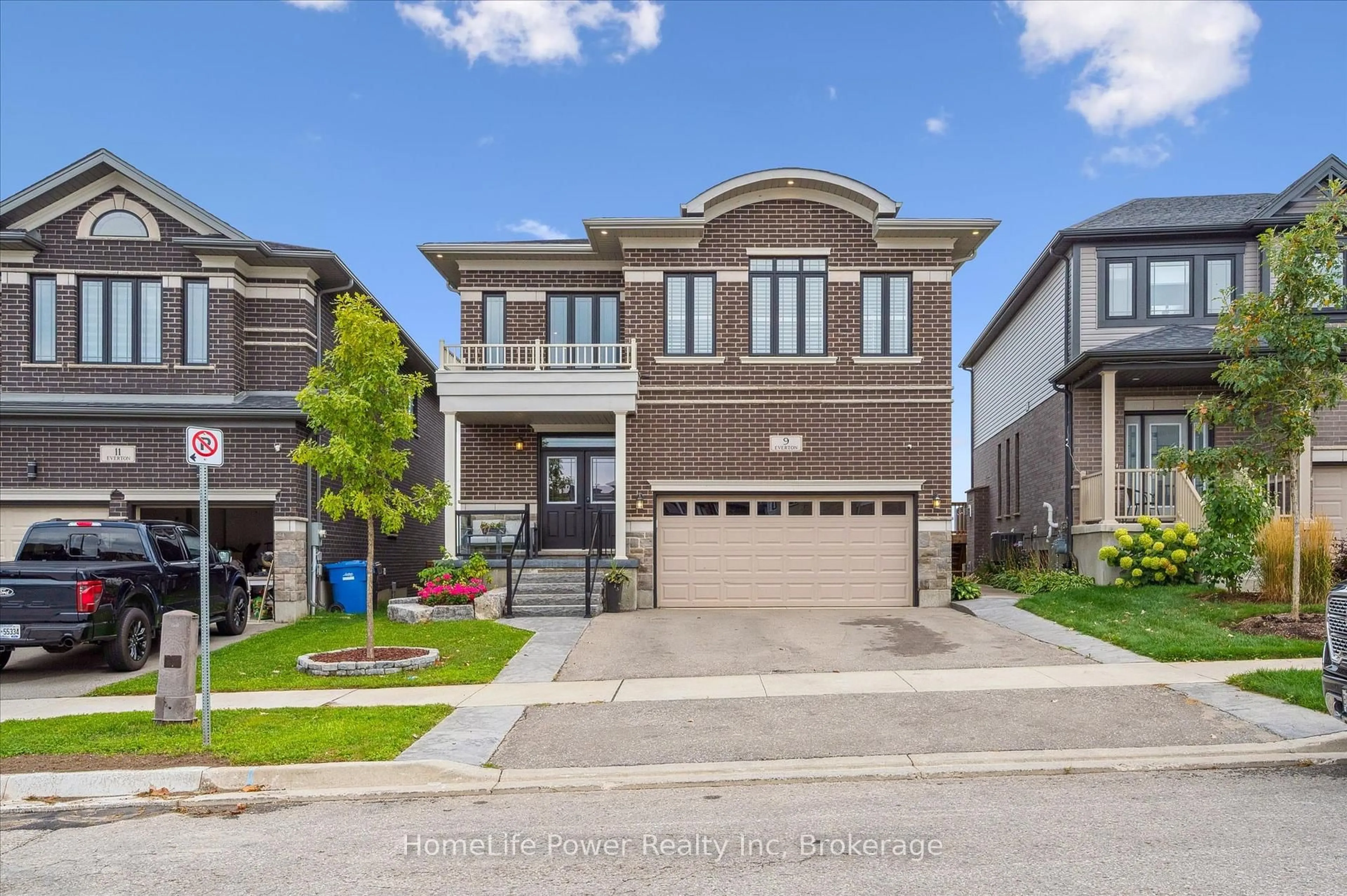 Home with brick exterior material, street for 9 Everton Dr, Guelph Ontario N1E 0R9