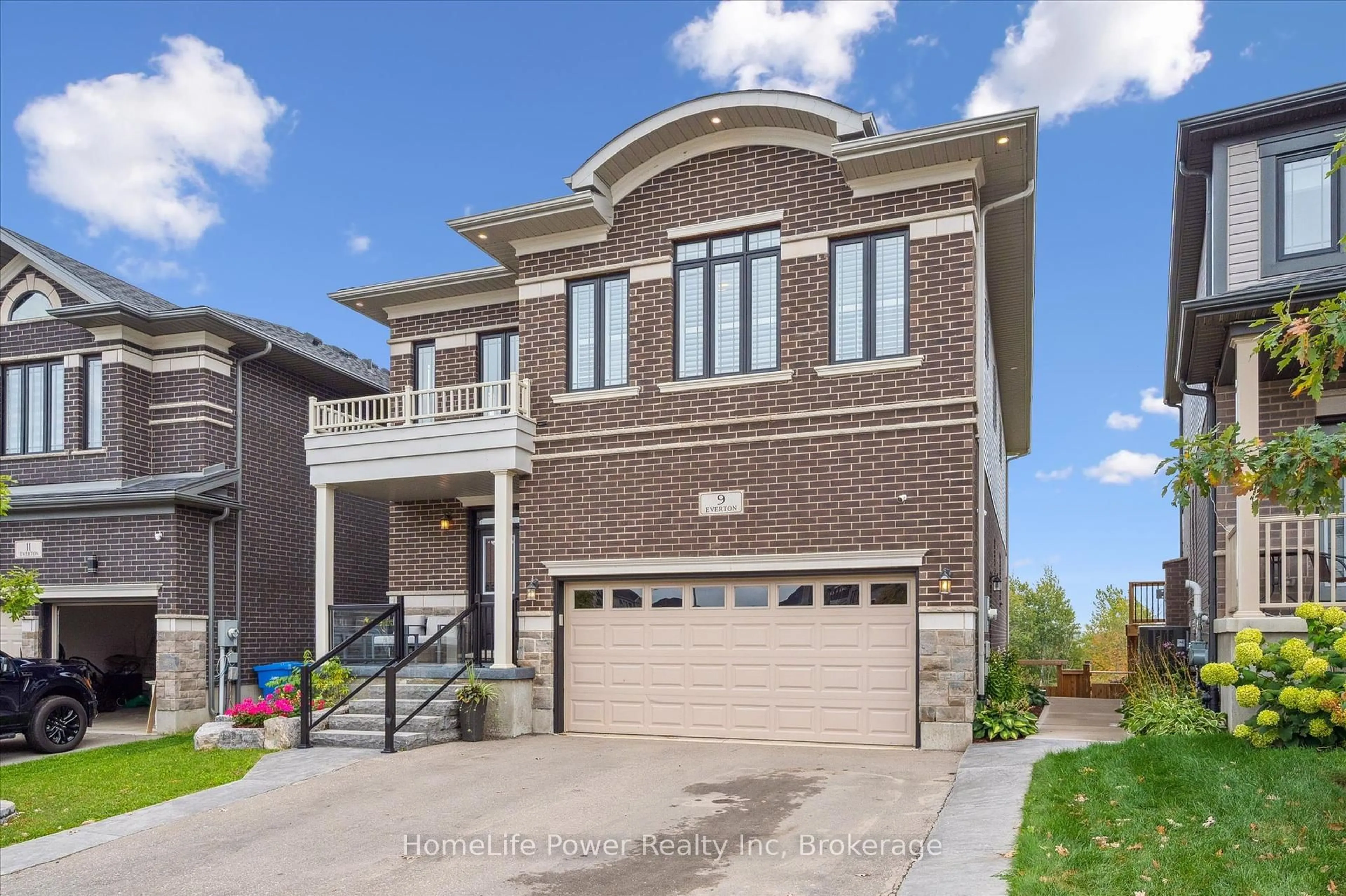 Home with brick exterior material, street for 9 Everton Dr, Guelph Ontario N1E 0R9