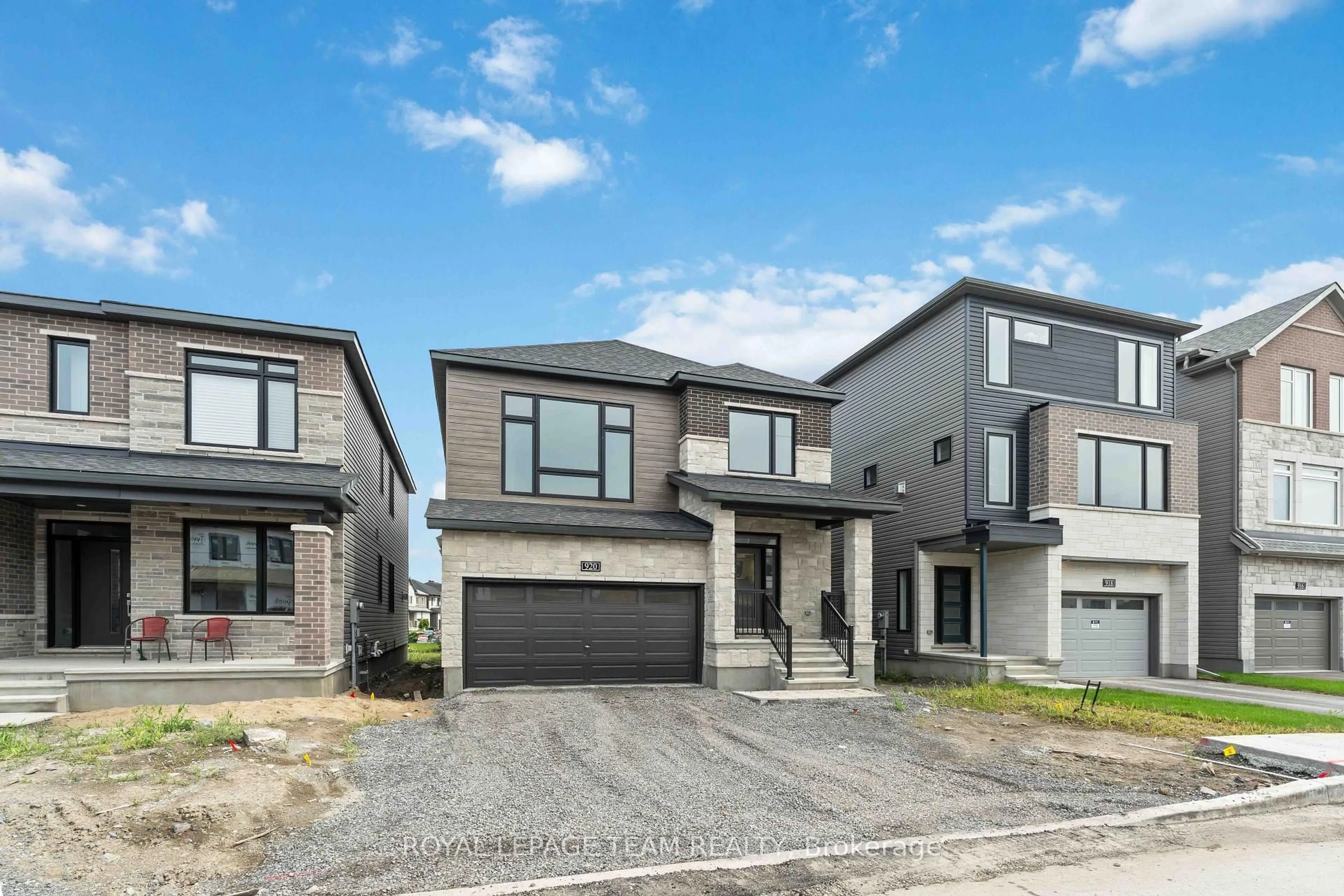Home with brick exterior material, street for 920 Locomotion Lane, Kanata Ontario K2V 0V3