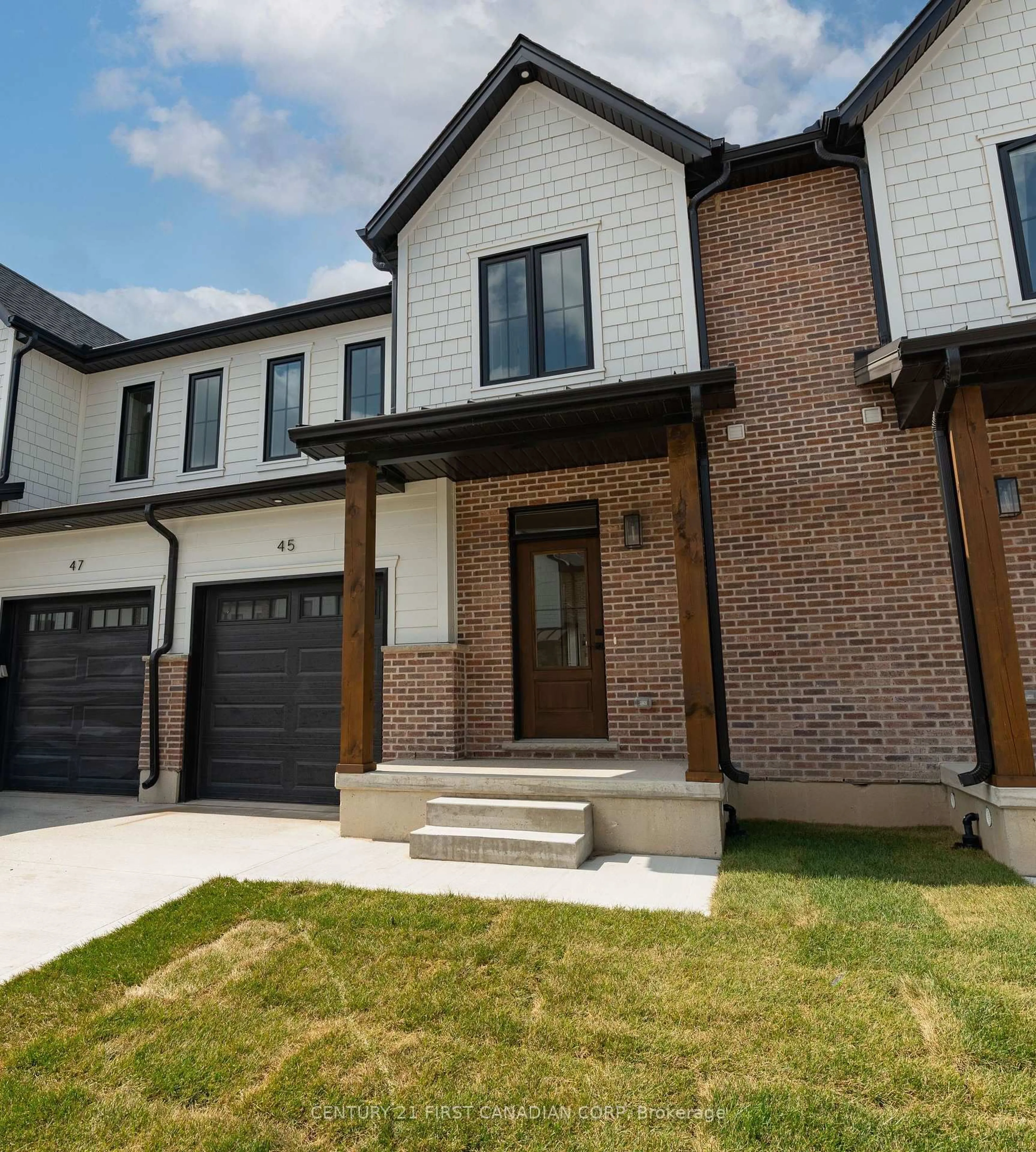 Home with brick exterior material, street for 147-45 SCOTTS Dr, Lucan Biddulph Ontario N0M 2J0