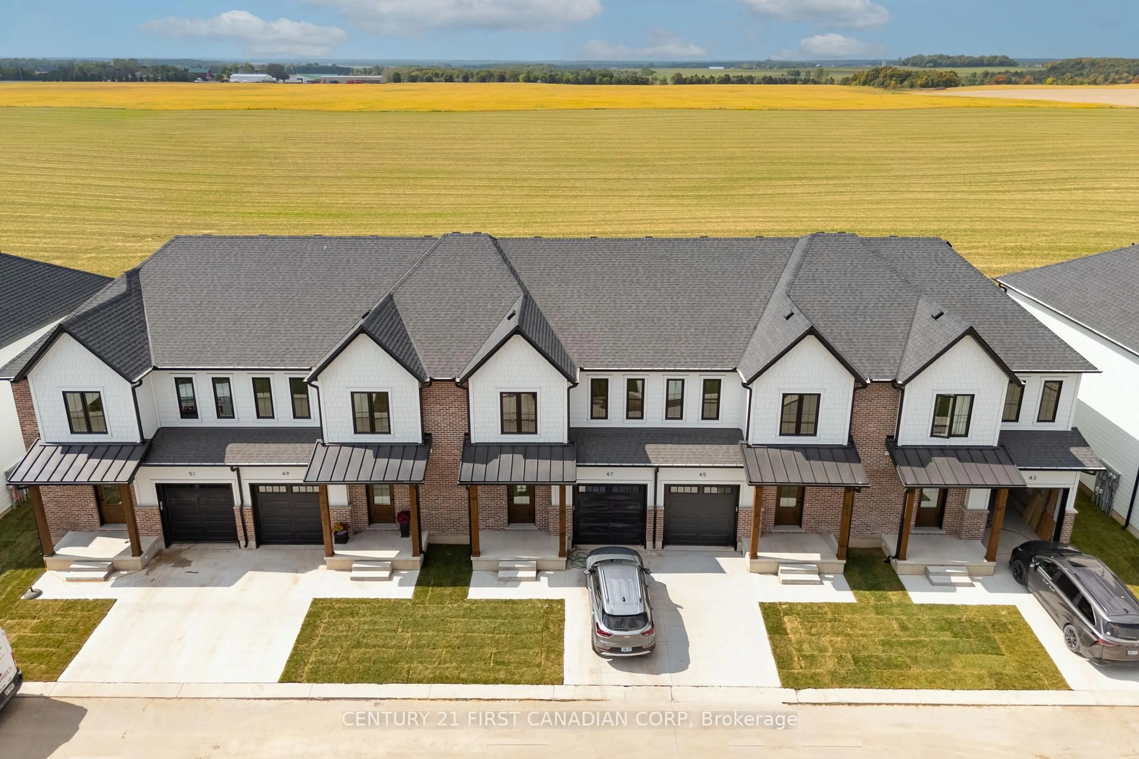 A pic from outside/outdoor area/front of a property/back of a property/a pic from drone, street for 147-45 SCOTTS Dr, Lucan Biddulph Ontario N0M 2J0