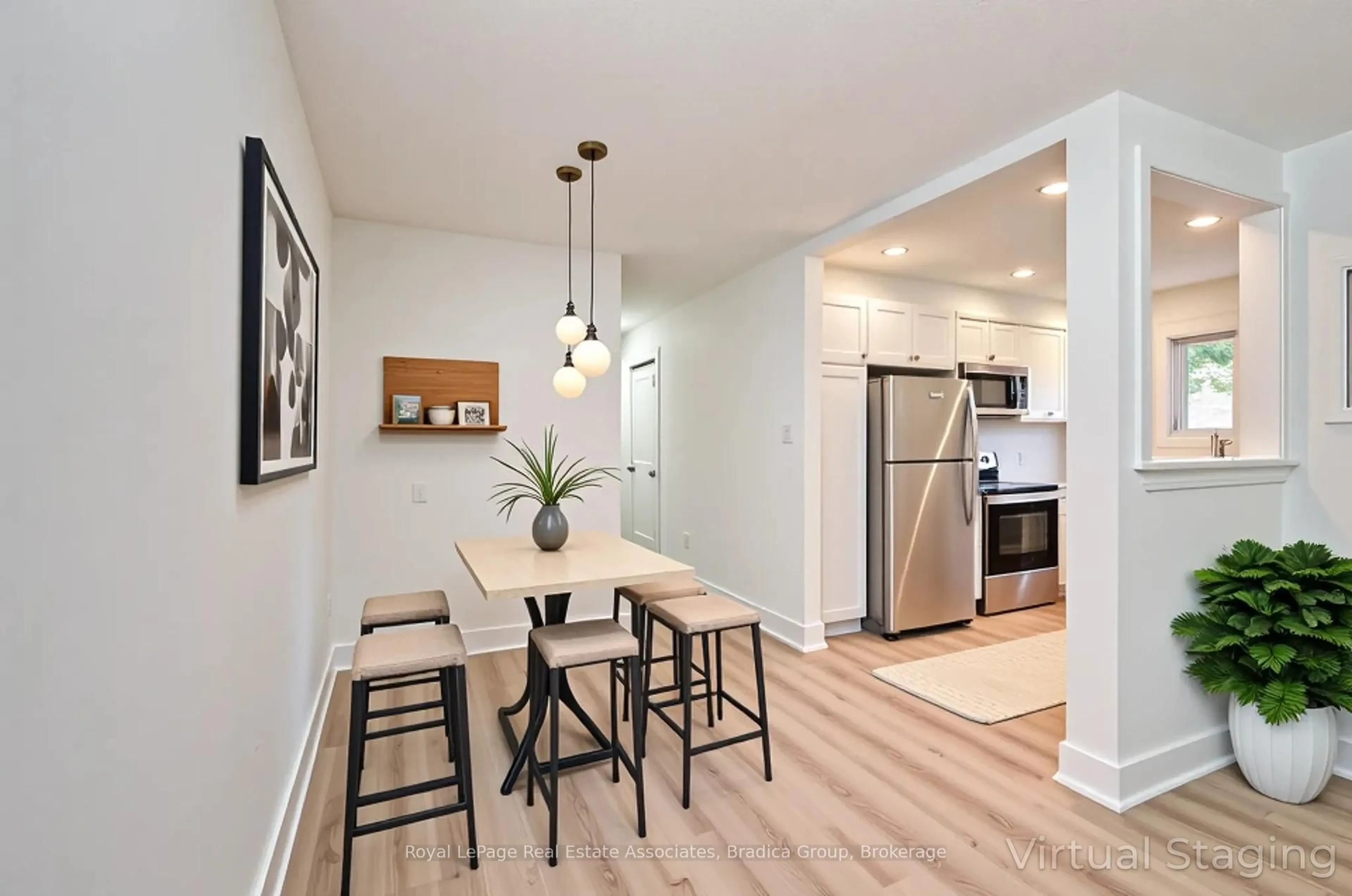 Open concept kitchen, wood/laminate floor for 354 Southill Dr, Kitchener Ontario N2A 2R1