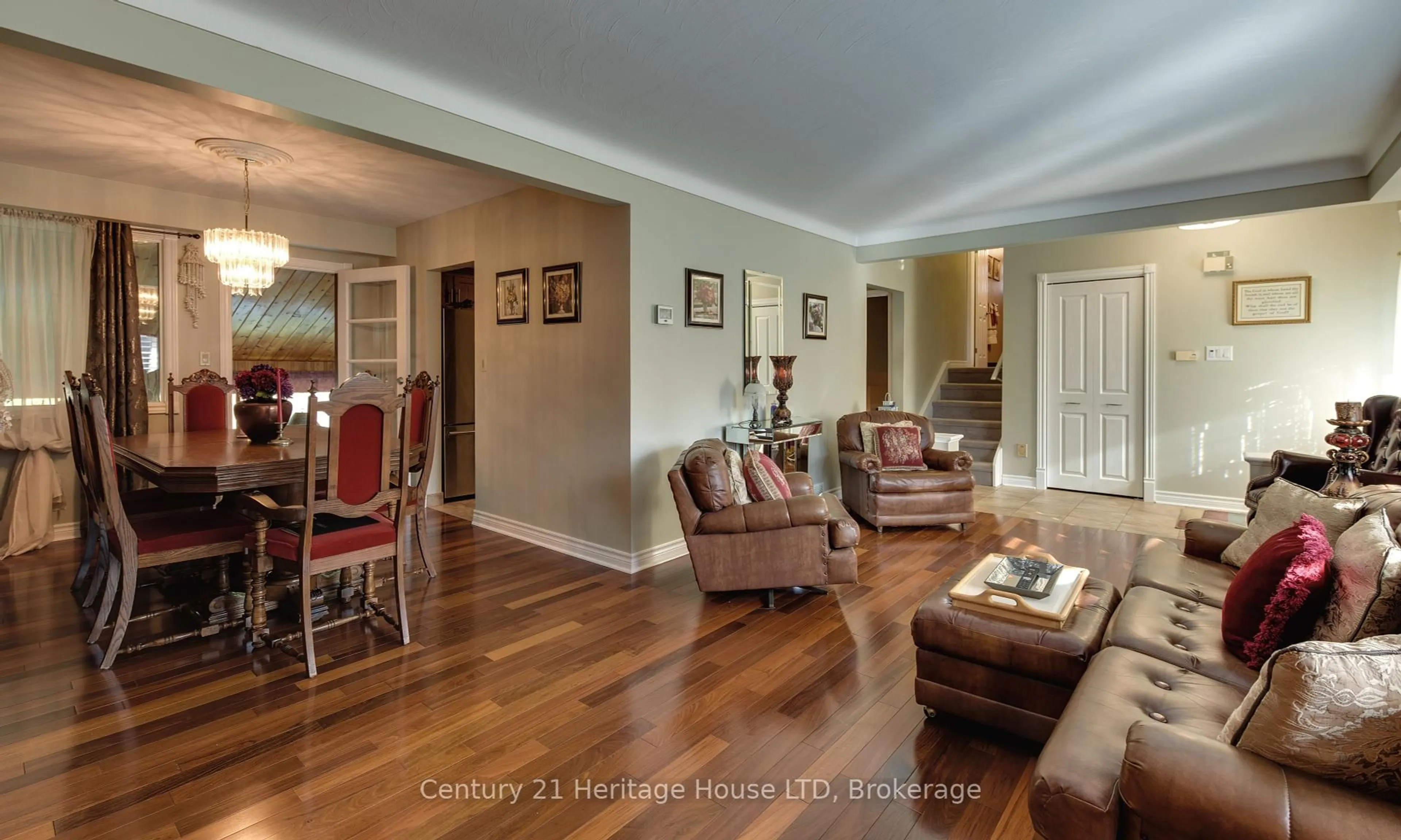 Living room with furniture, wood/laminate floor for 7835 Rysdale St, Niagara Falls Ontario L2H 1G5