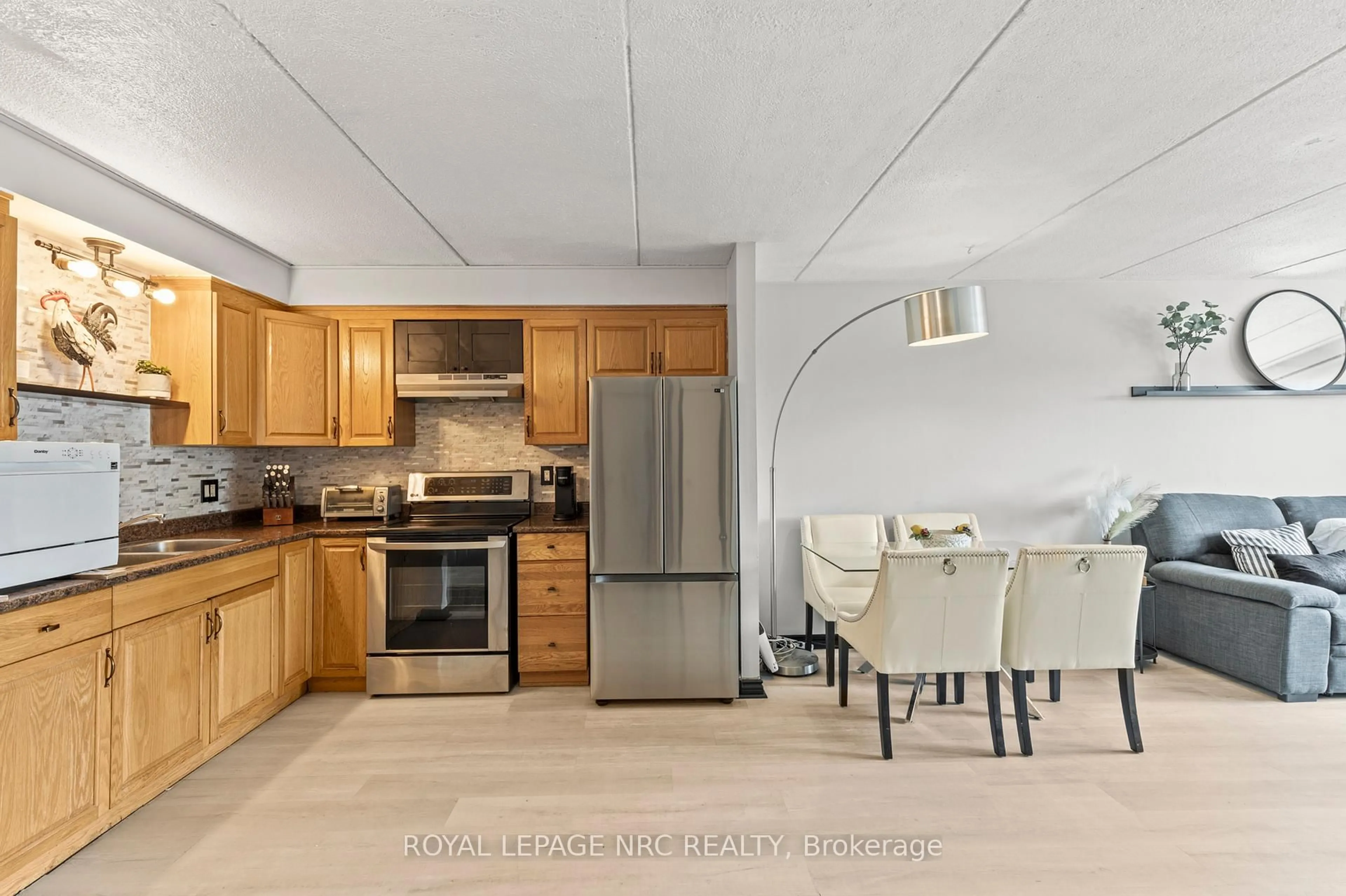 Open concept kitchen, ceramic/tile floor for 41 Rykert St #215, St. Catharines Ontario L2S 3A4