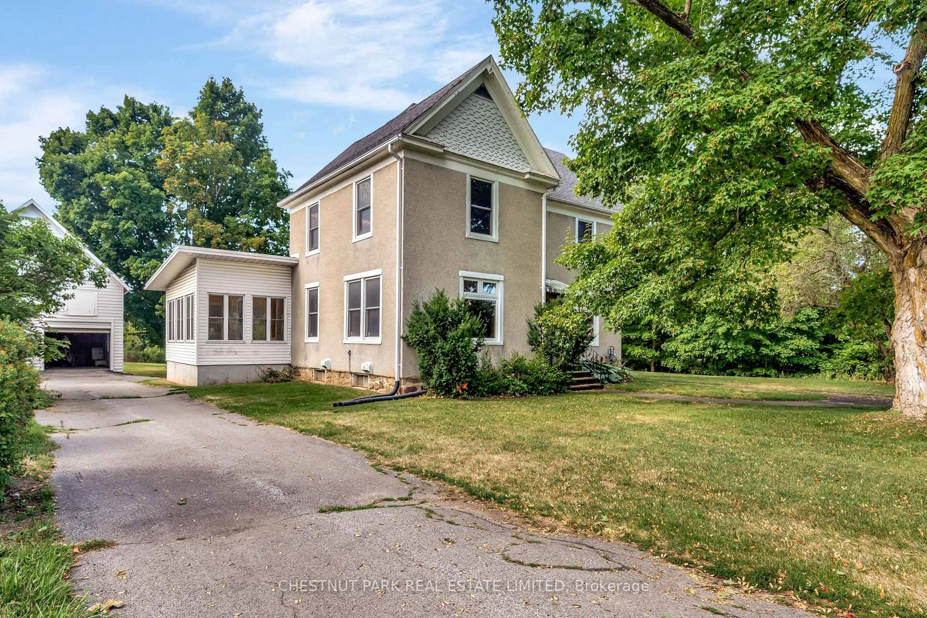 A pic from outside/outdoor area/front of a property/back of a property/a pic from drone, street for 385 Bloomfield Main St, Prince Edward County Ontario K0K 1G0