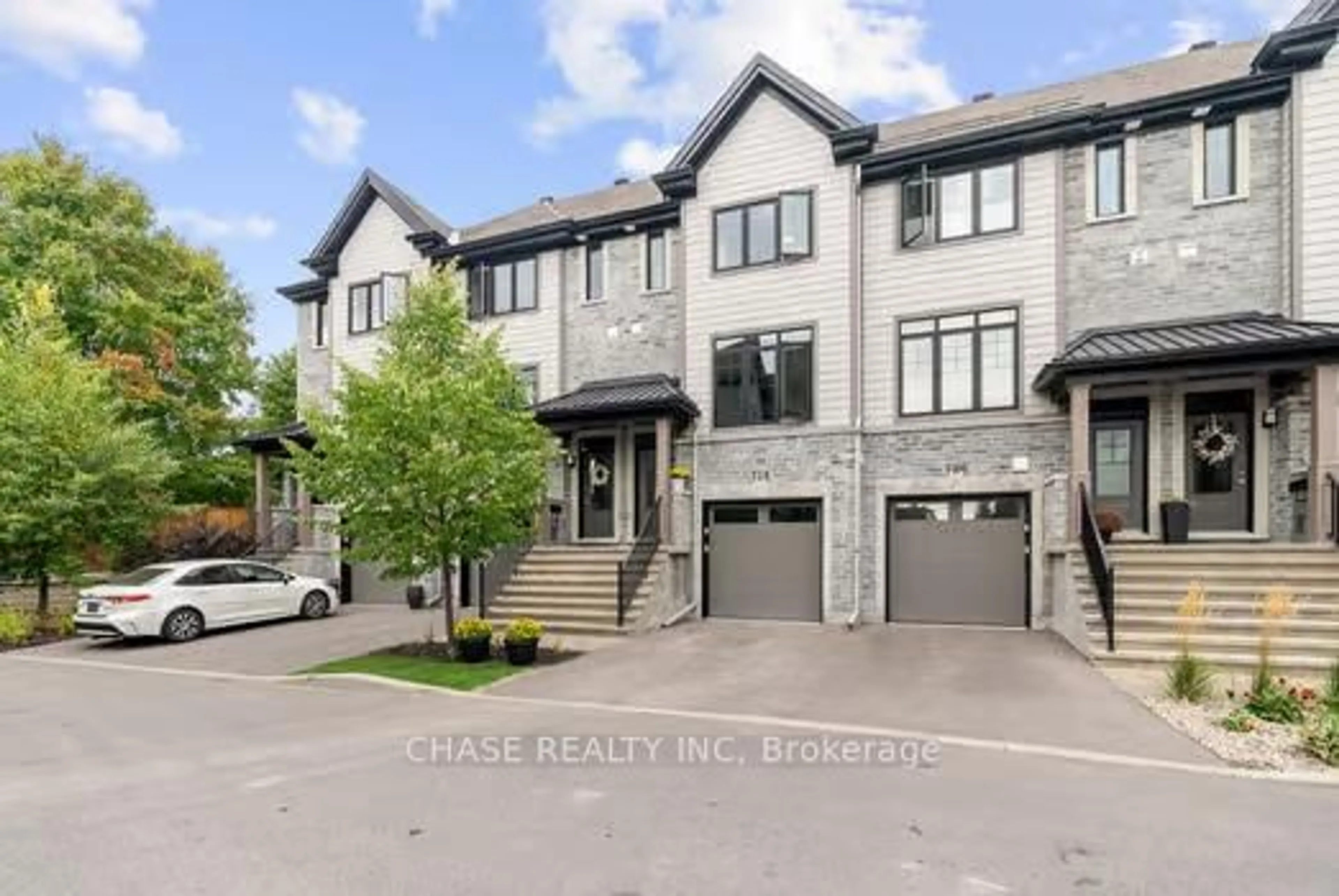 A pic from outside/outdoor area/front of a property/back of a property/a pic from drone, street for 728 Reverie Private, Ottawa Ontario K2S 0T9