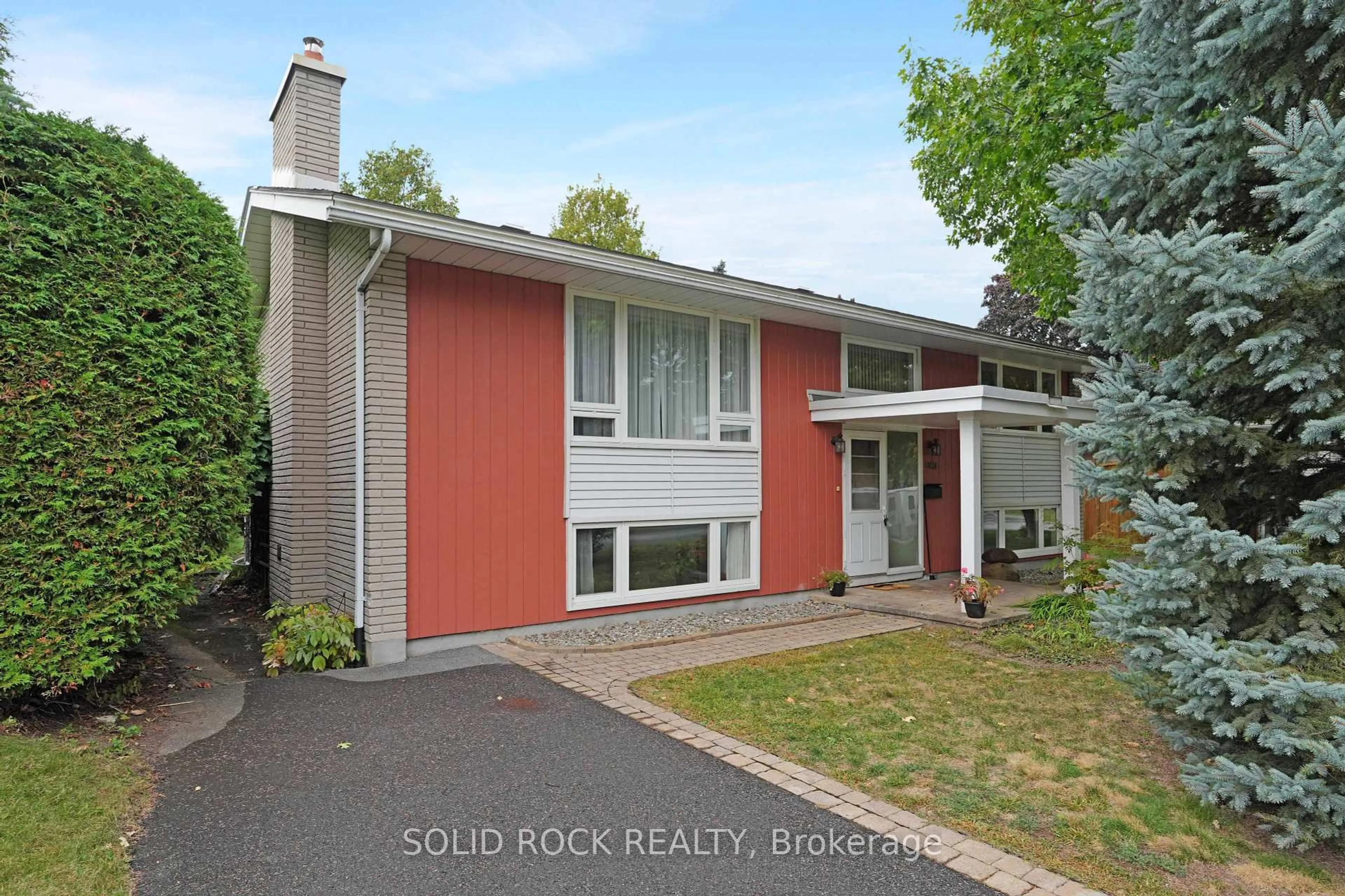 Home with brick exterior material, street for 1034 Riddell Ave, Ottawa Ontario K2C 2J7