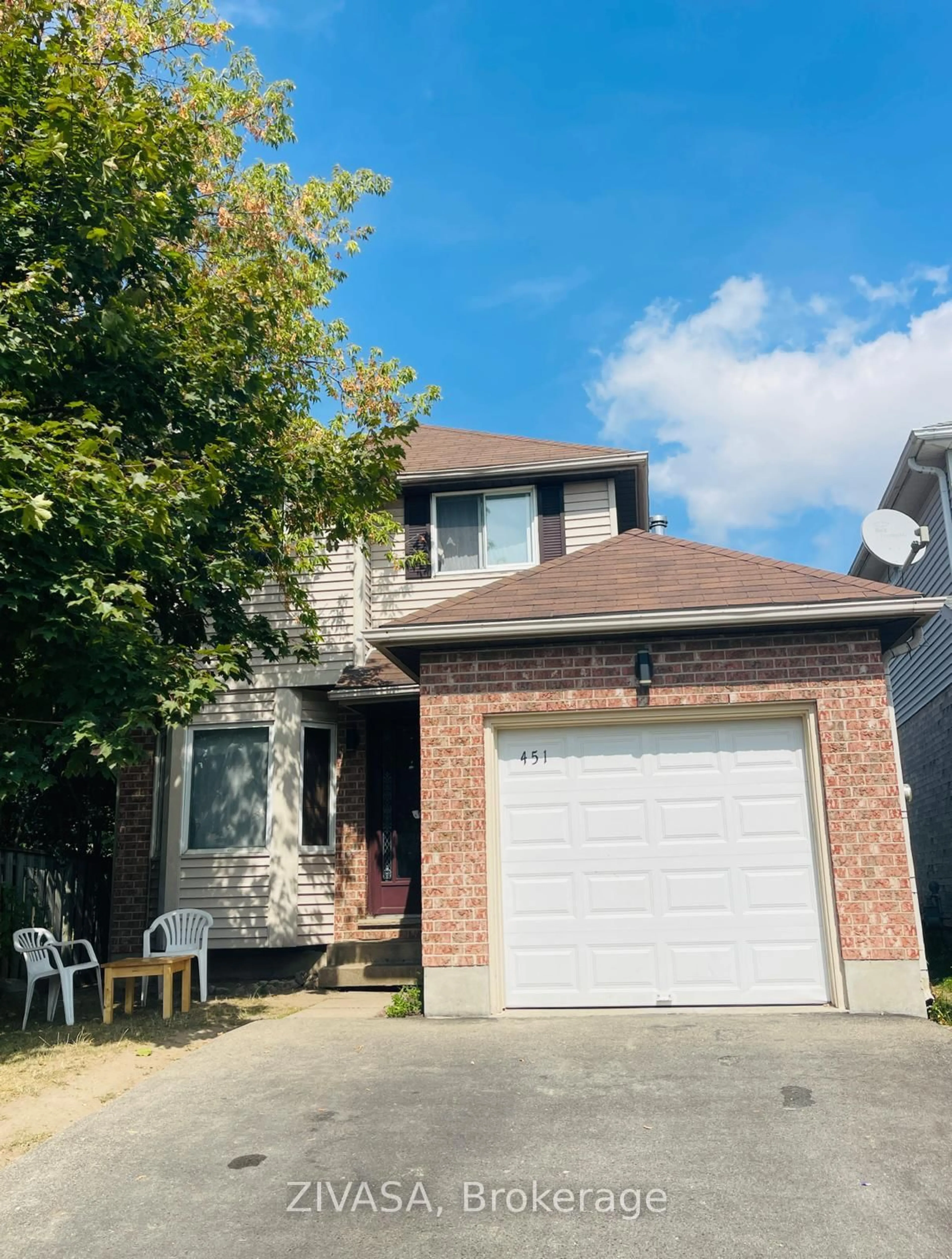 Home with brick exterior material, street for 451 Auden Rd, Guelph Ontario N1E 6V7