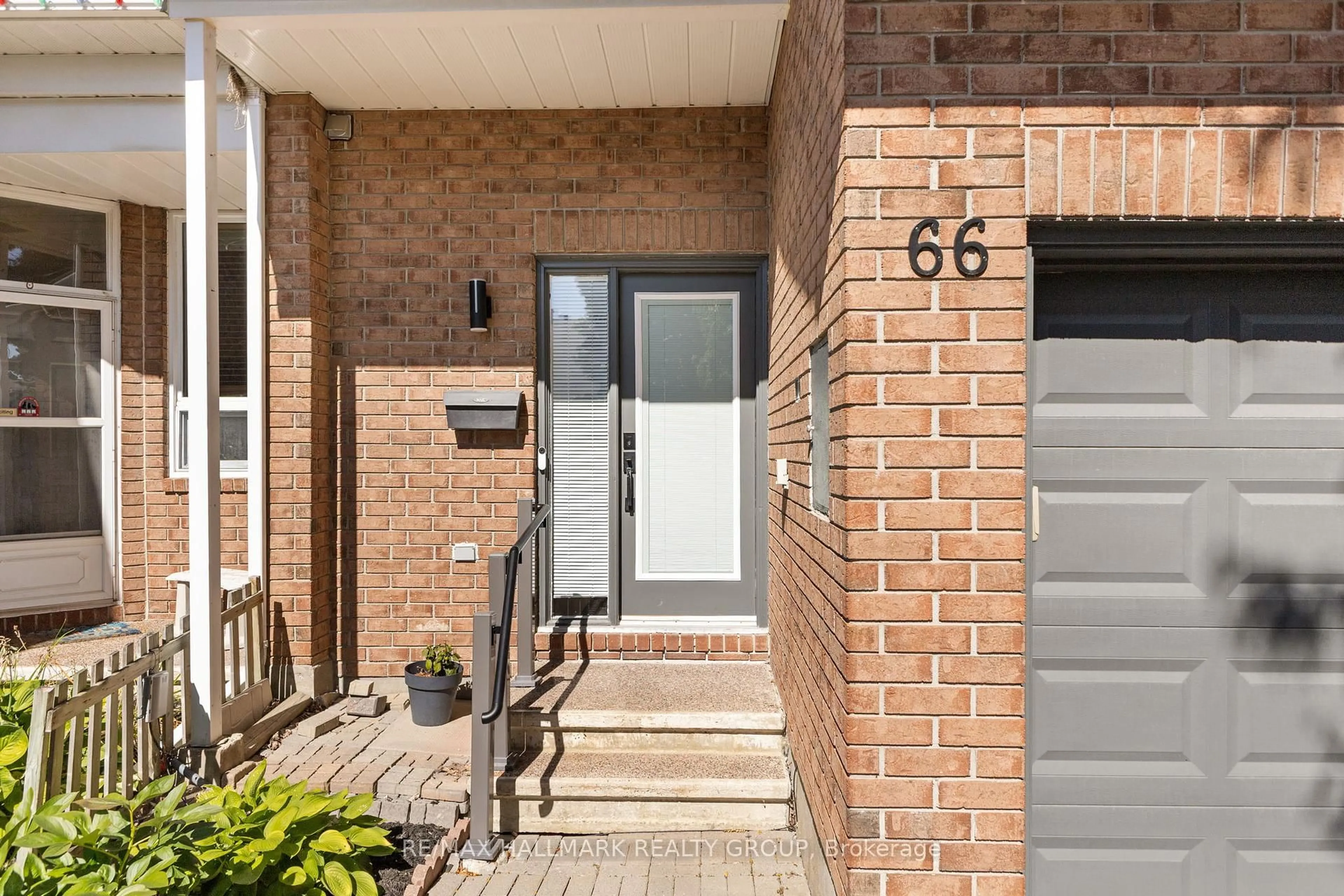 Home with brick exterior material, street for 66 Halley St, Barrhaven Ontario K2J 3R3