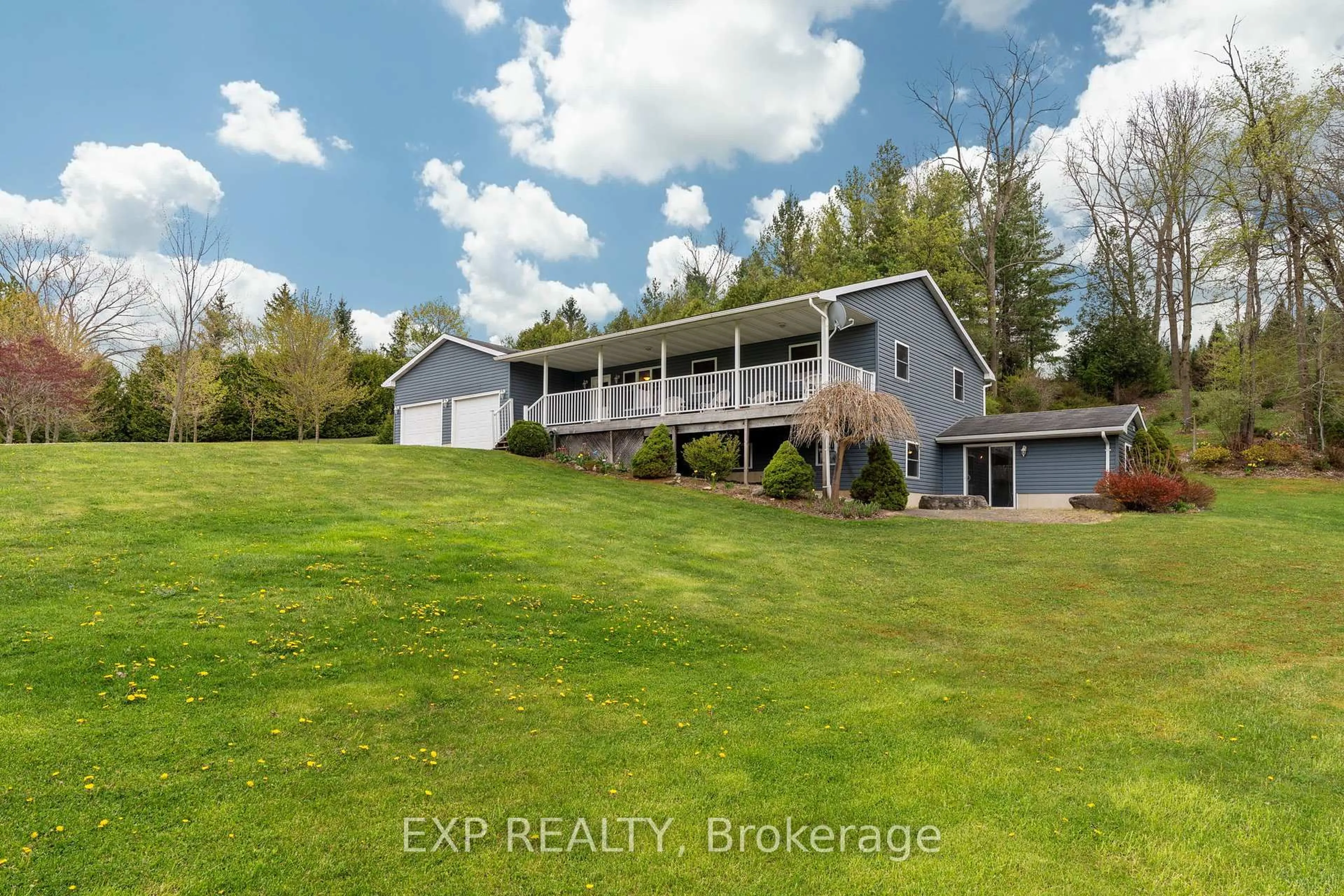 A pic from outside/outdoor area/front of a property/back of a property/a pic from drone, water/lake/river/ocean view for 30680 Hungry Hollow Rd, North Middlesex Ontario N0M 1B0
