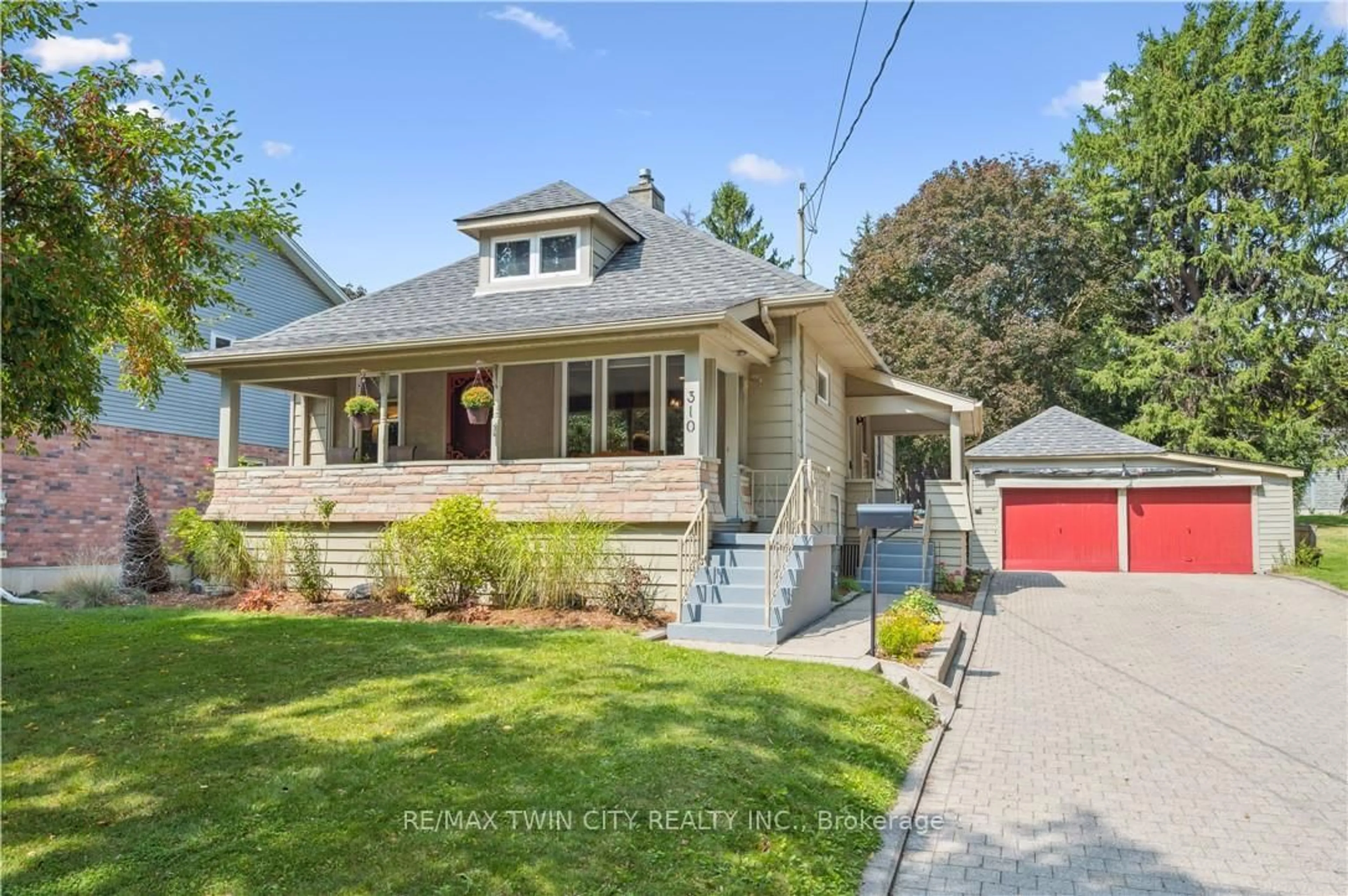 Home with brick exterior material, street for 310 Kitchener Rd, Cambridge Ontario N3H 1A6