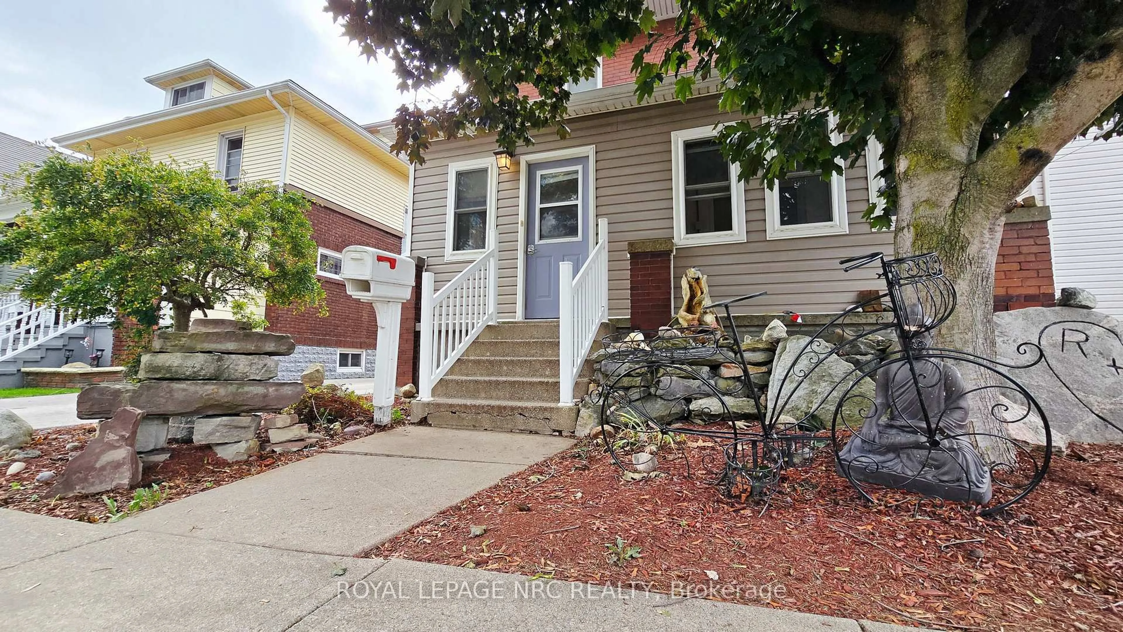 Home with vinyl exterior material, street for 74 Delhi St, Port Colborne Ontario L3K 3K8