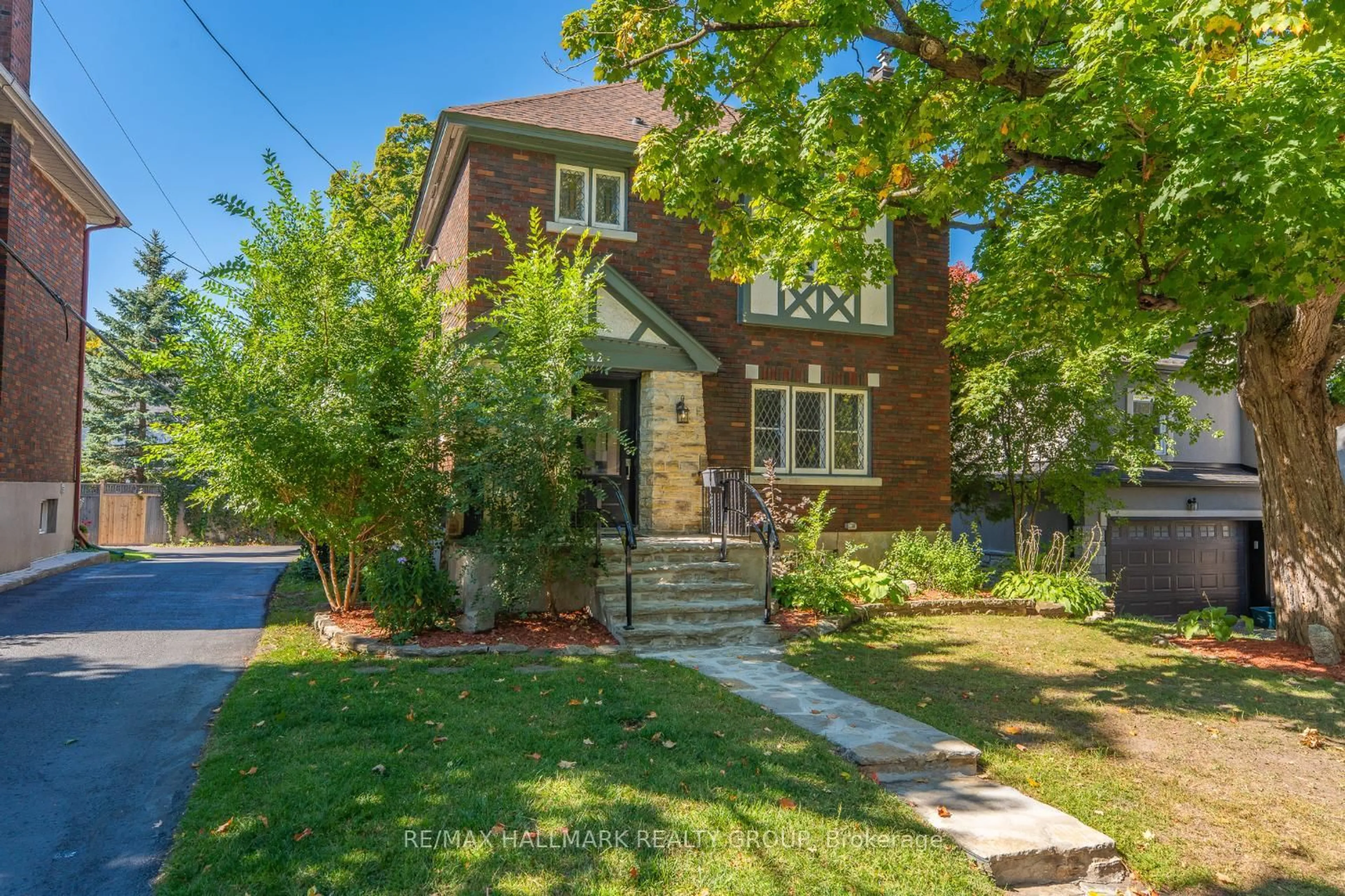 Home with brick exterior material, street for 242 Harmer Ave, Ottawa Ontario K1Y 0V6