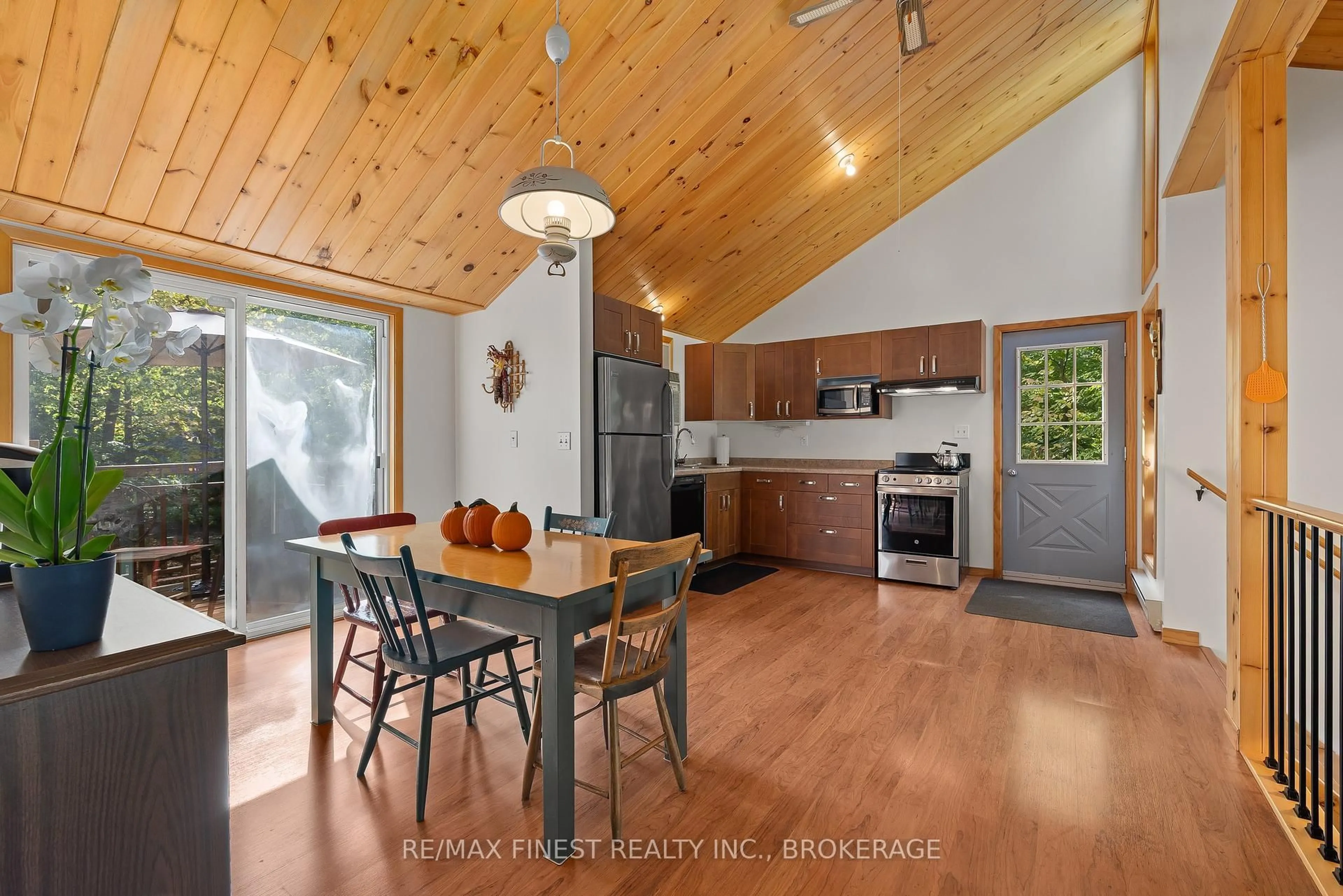 Open concept kitchen, wood/laminate floor for 740C Thomas Rd, Rideau Lakes Ontario K9J 6X2