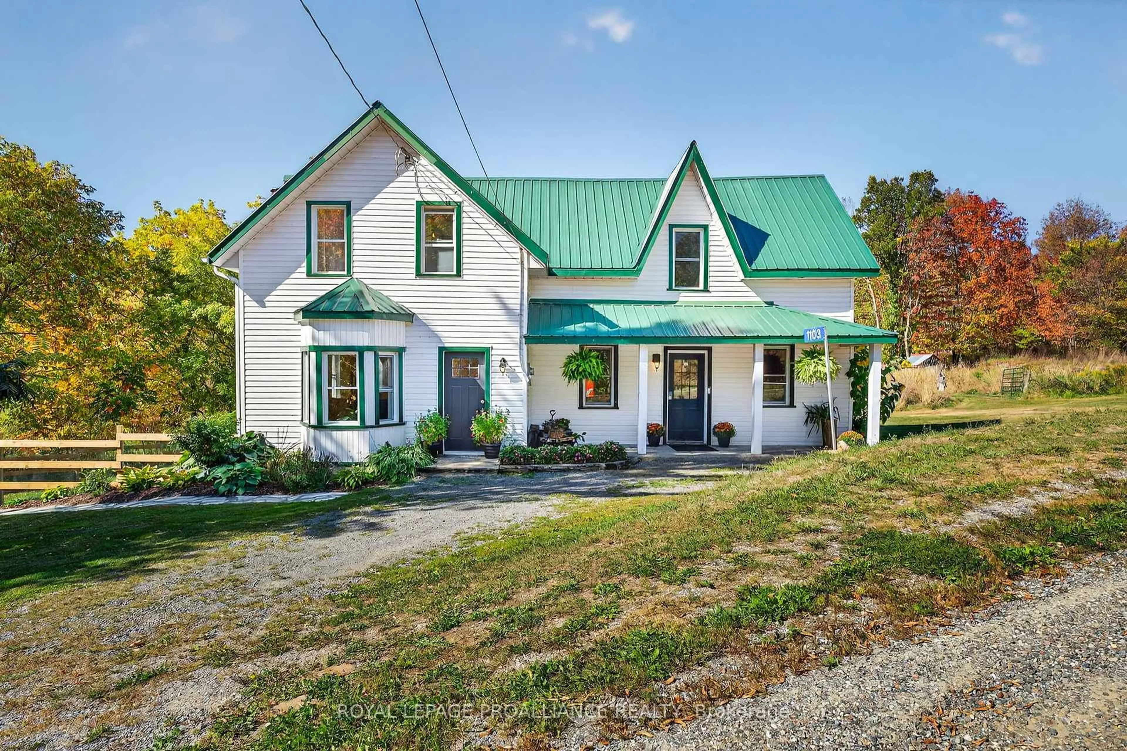 Home with vinyl exterior material, street for 1103 Cronk Rd, Parham Ontario K0H 2K0