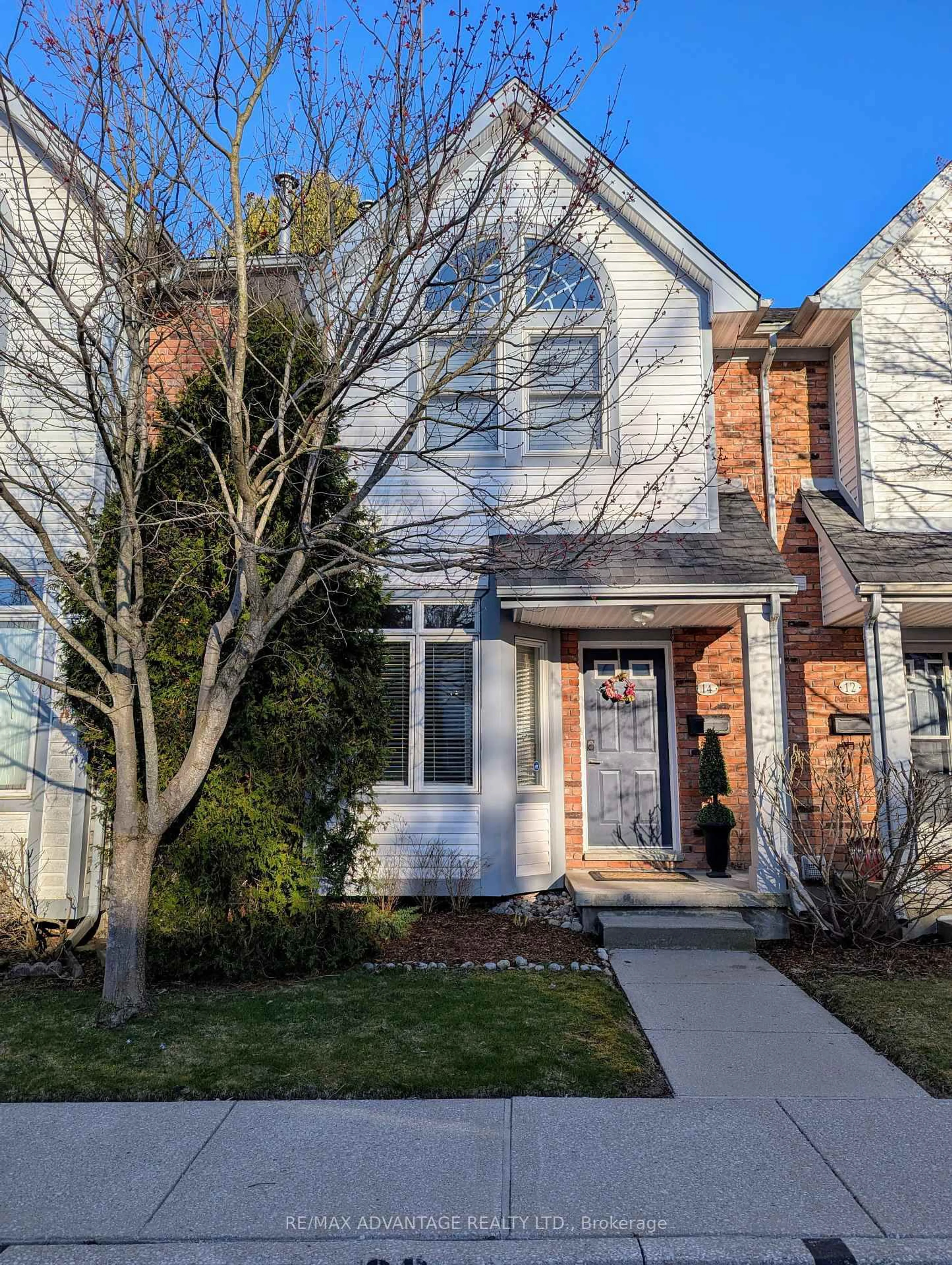 Home with brick exterior material, street for 1415 Commissioners Rd #14, London South Ontario N6K 1E2