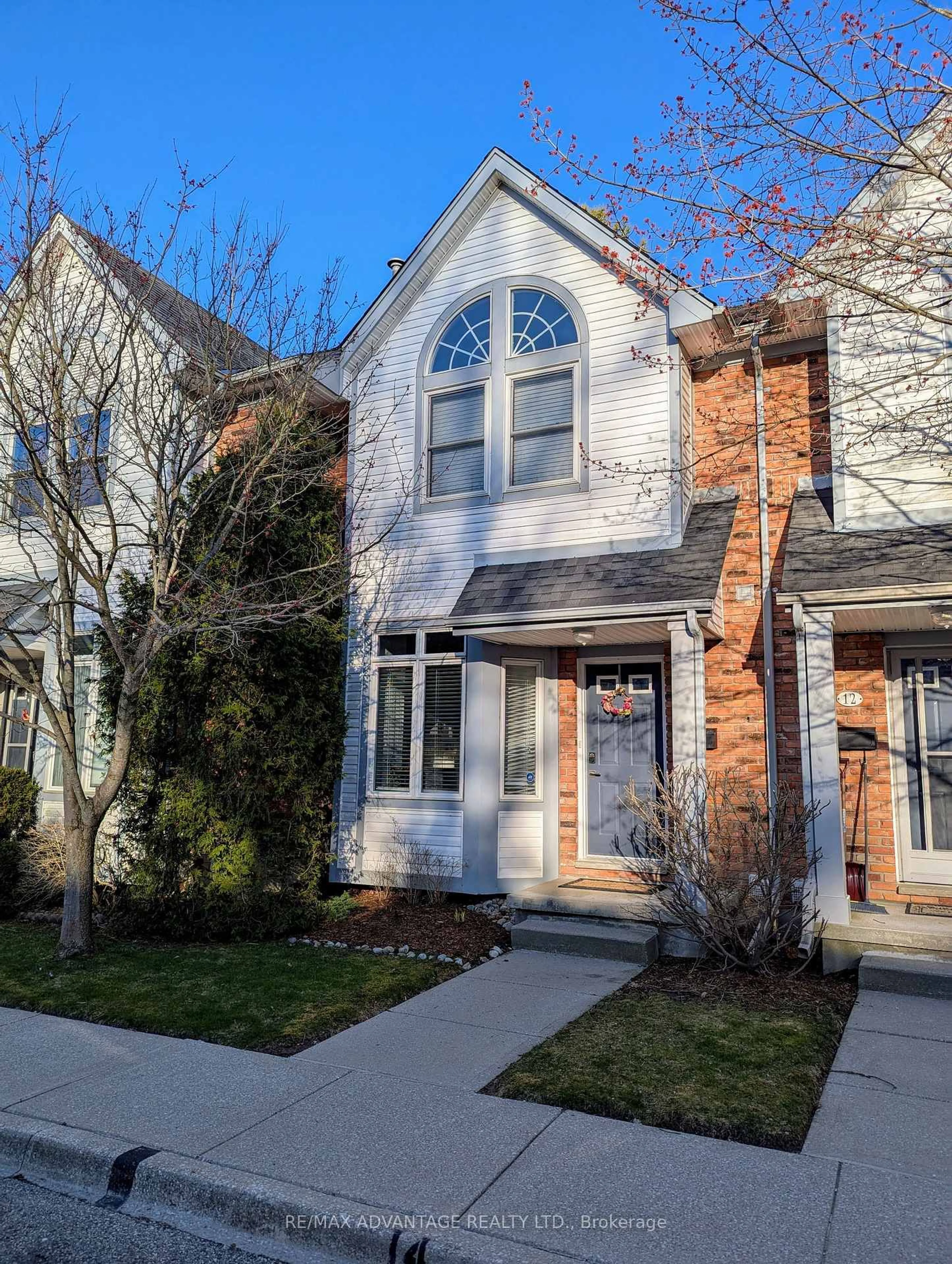 Home with brick exterior material, street for 1415 Commissioners Rd #14, London South Ontario N6K 1E2