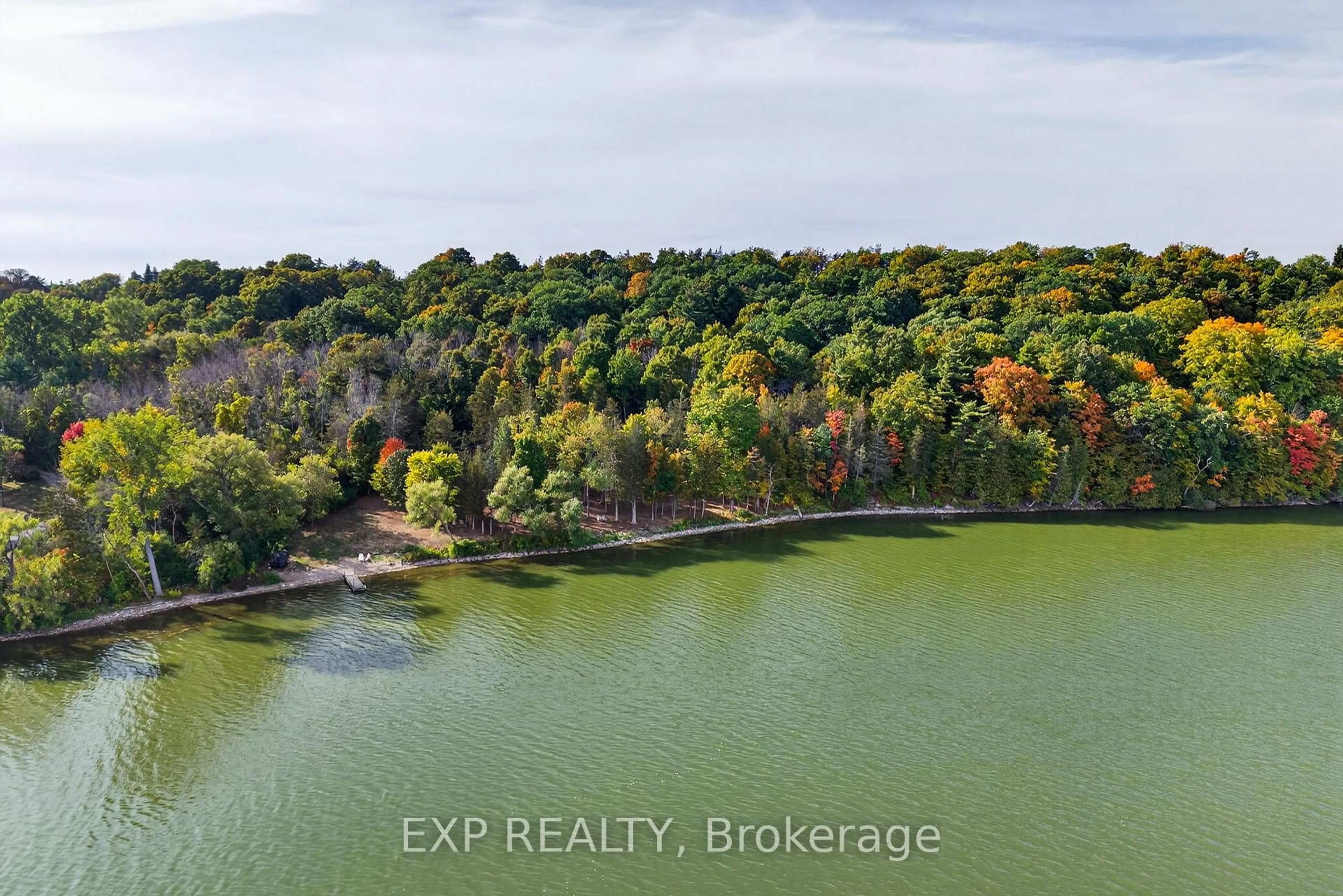 A pic from outside/outdoor area/front of a property/back of a property/a pic from drone, water/lake/river/ocean view for 130 County 35 Rd, Prince Edward County Ontario K0K 2T0