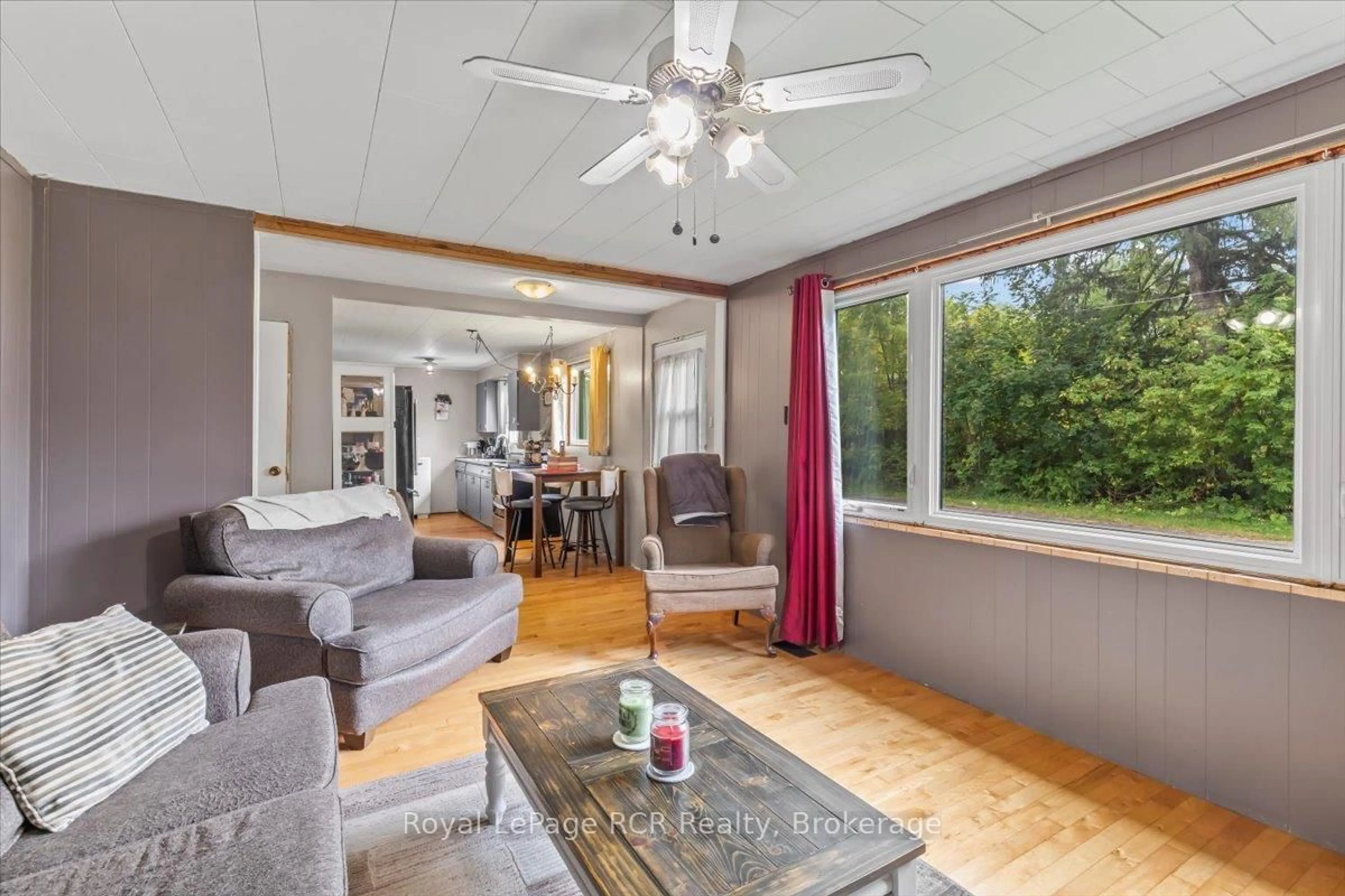 Living room with furniture, wood/laminate floor for 27 William St, West Grey Ontario N0G 1S0