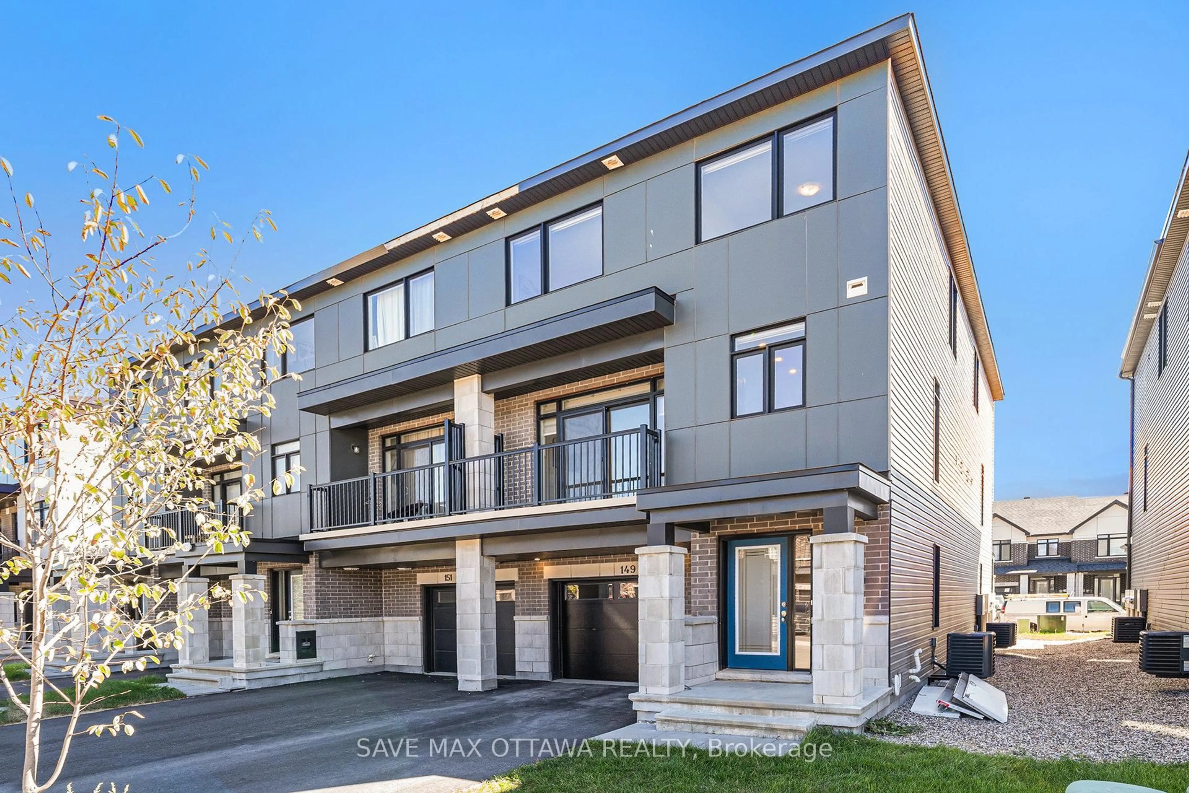 Home with brick exterior material, street for 149 Lemon Leaf Lane, Ottawa Ontario K1T 3X1