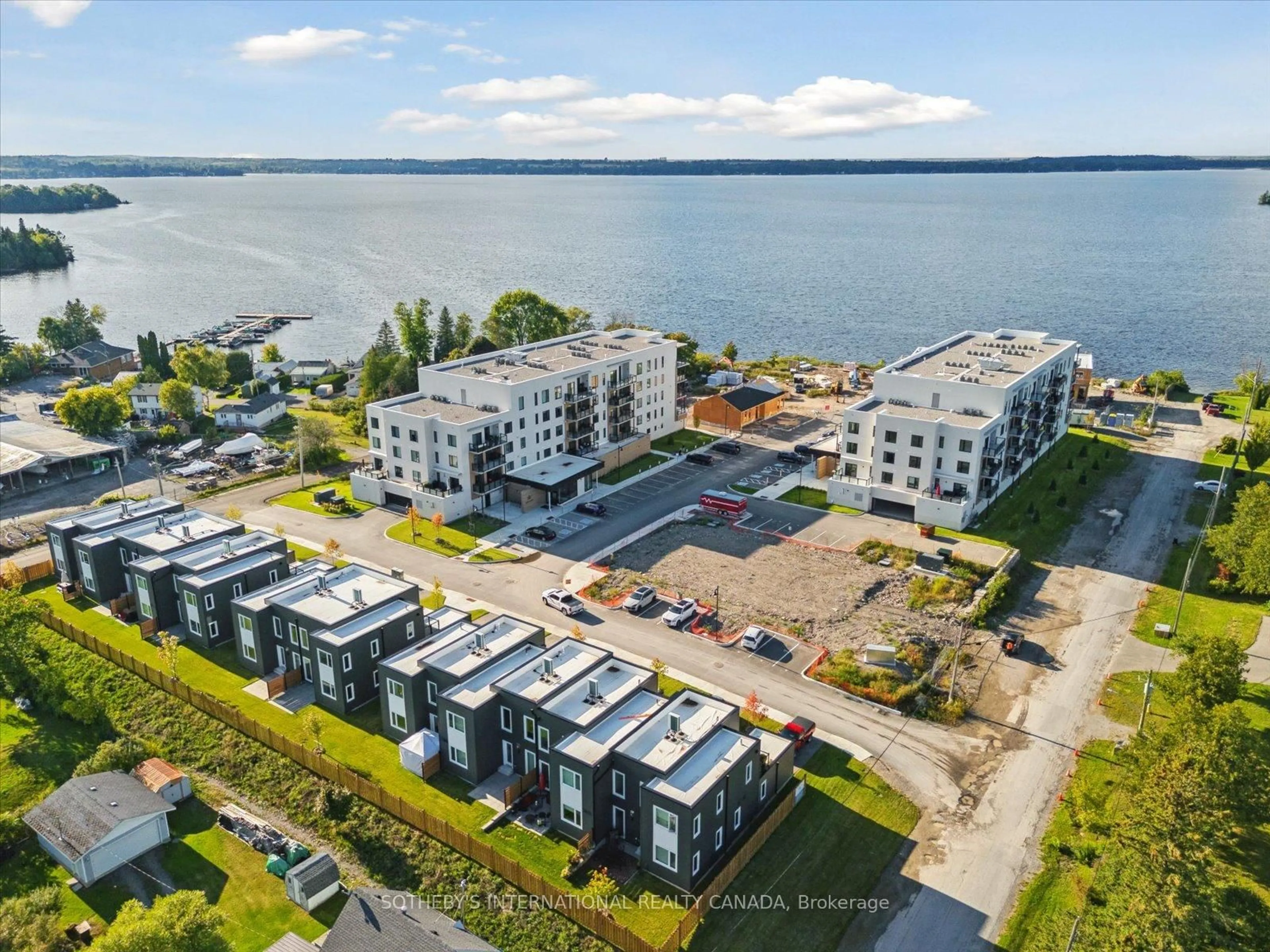 A pic from outside/outdoor area/front of a property/back of a property/a pic from drone, water/lake/river/ocean view for 19B West St #201, Kawartha Lakes Ontario K0M 1N0