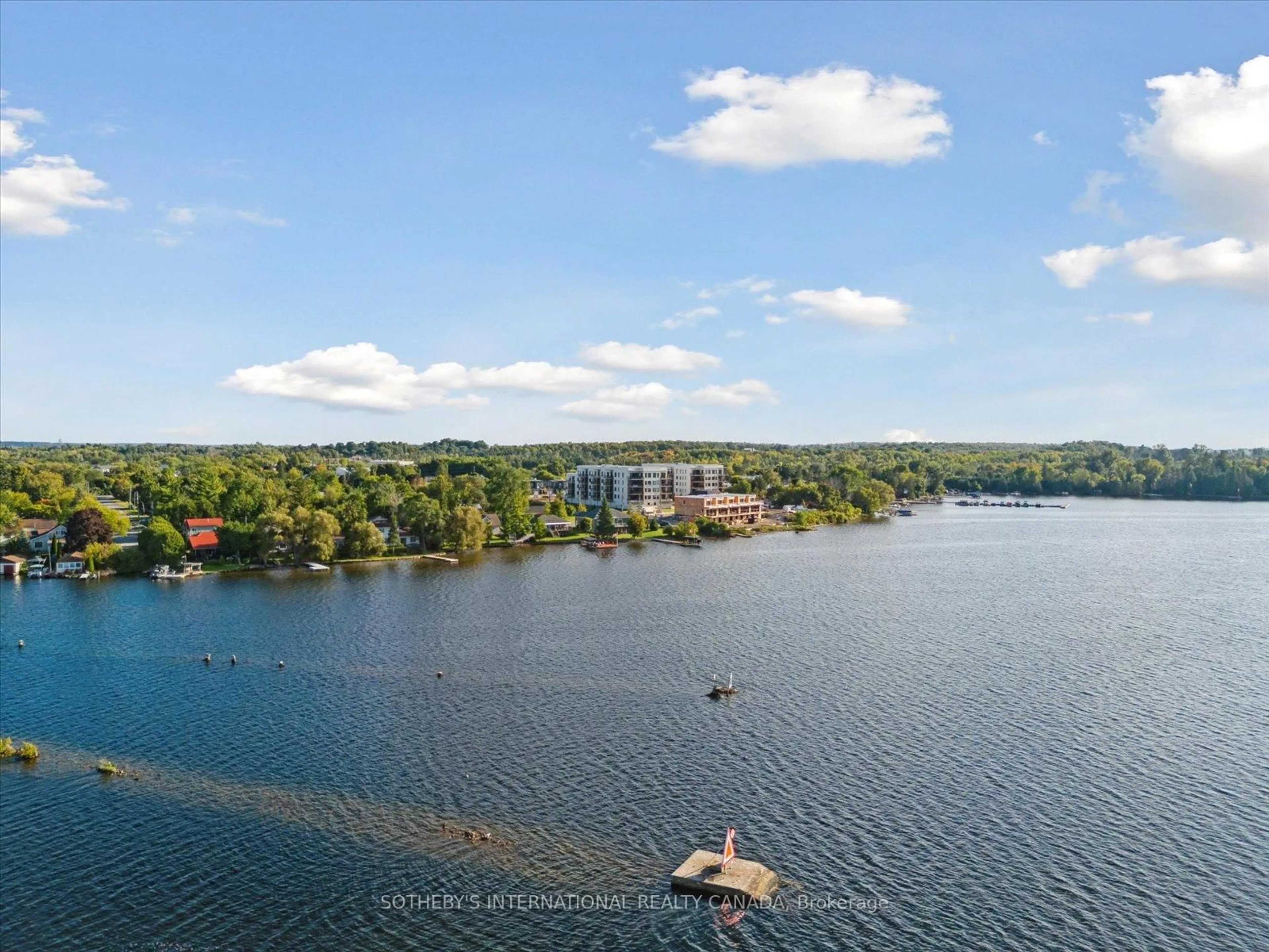 A pic from outside/outdoor area/front of a property/back of a property/a pic from drone, water/lake/river/ocean view for 19B West St #201, Kawartha Lakes Ontario K0M 1N0