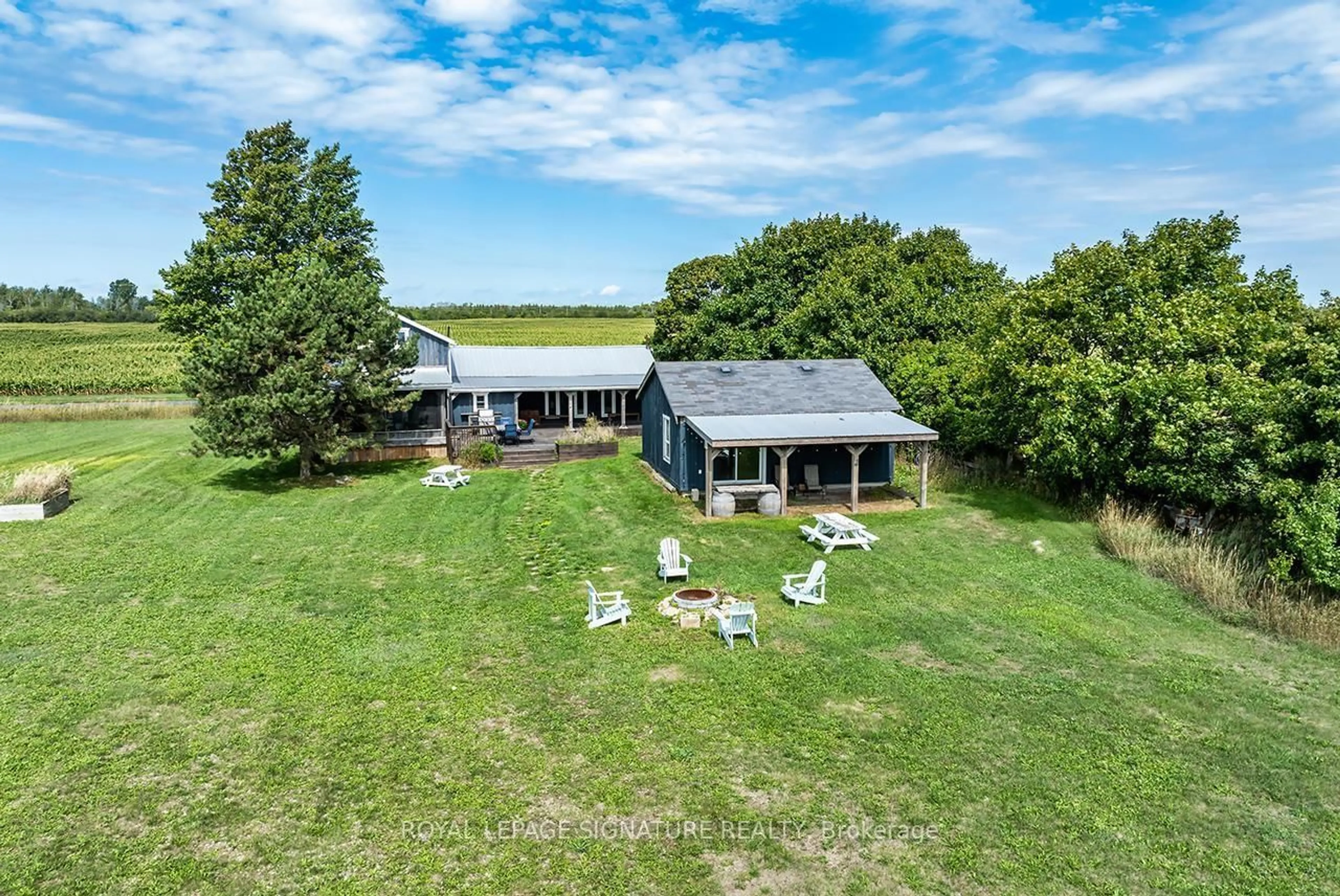 A pic from outside/outdoor area/front of a property/back of a property/a pic from drone, water/lake/river/ocean view for 217 Greer Rd, Prince Edward County Ontario K0K 3L0