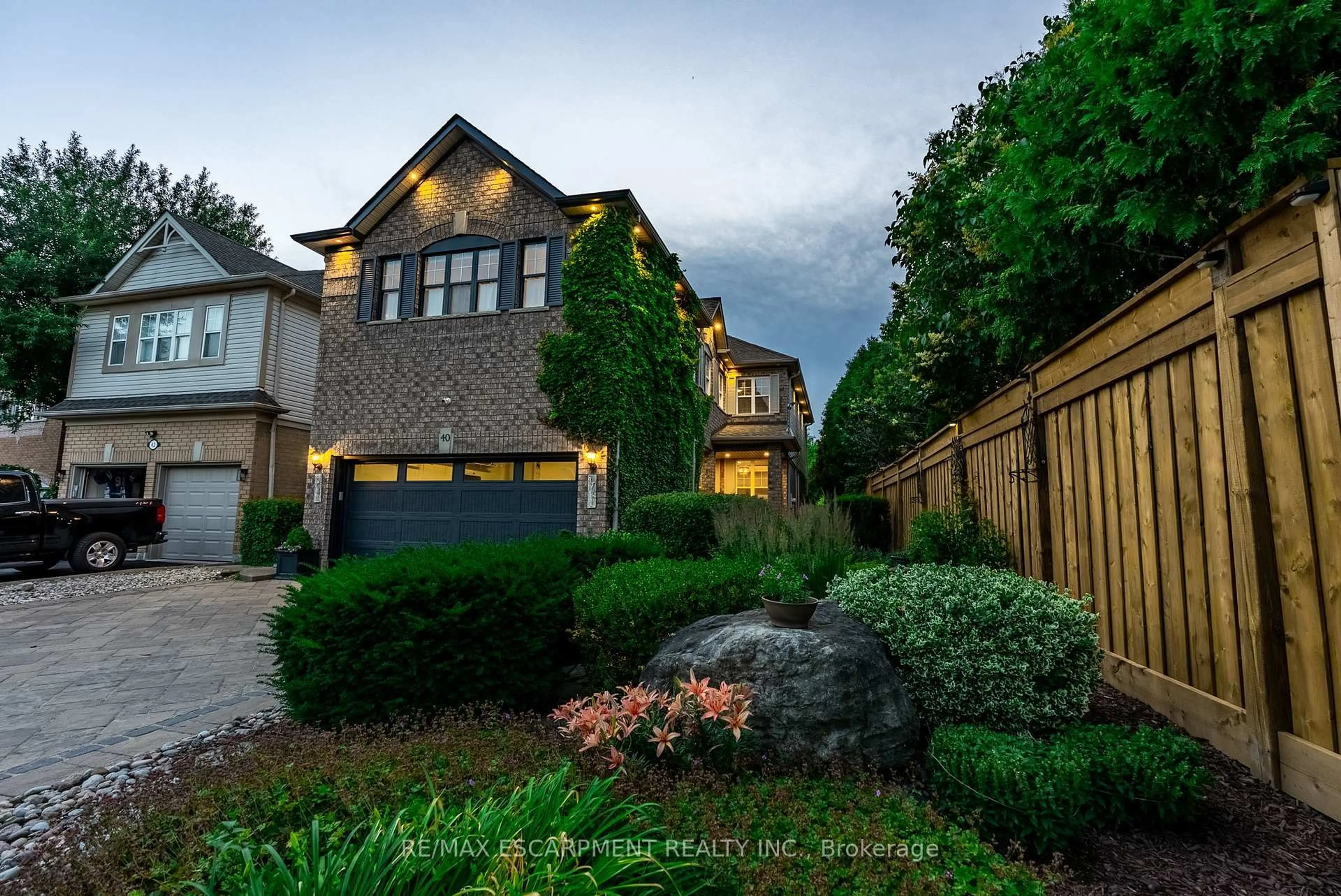 Home with brick exterior material, street for 40 Premier Rd, Hamilton Ontario L8B 0K7