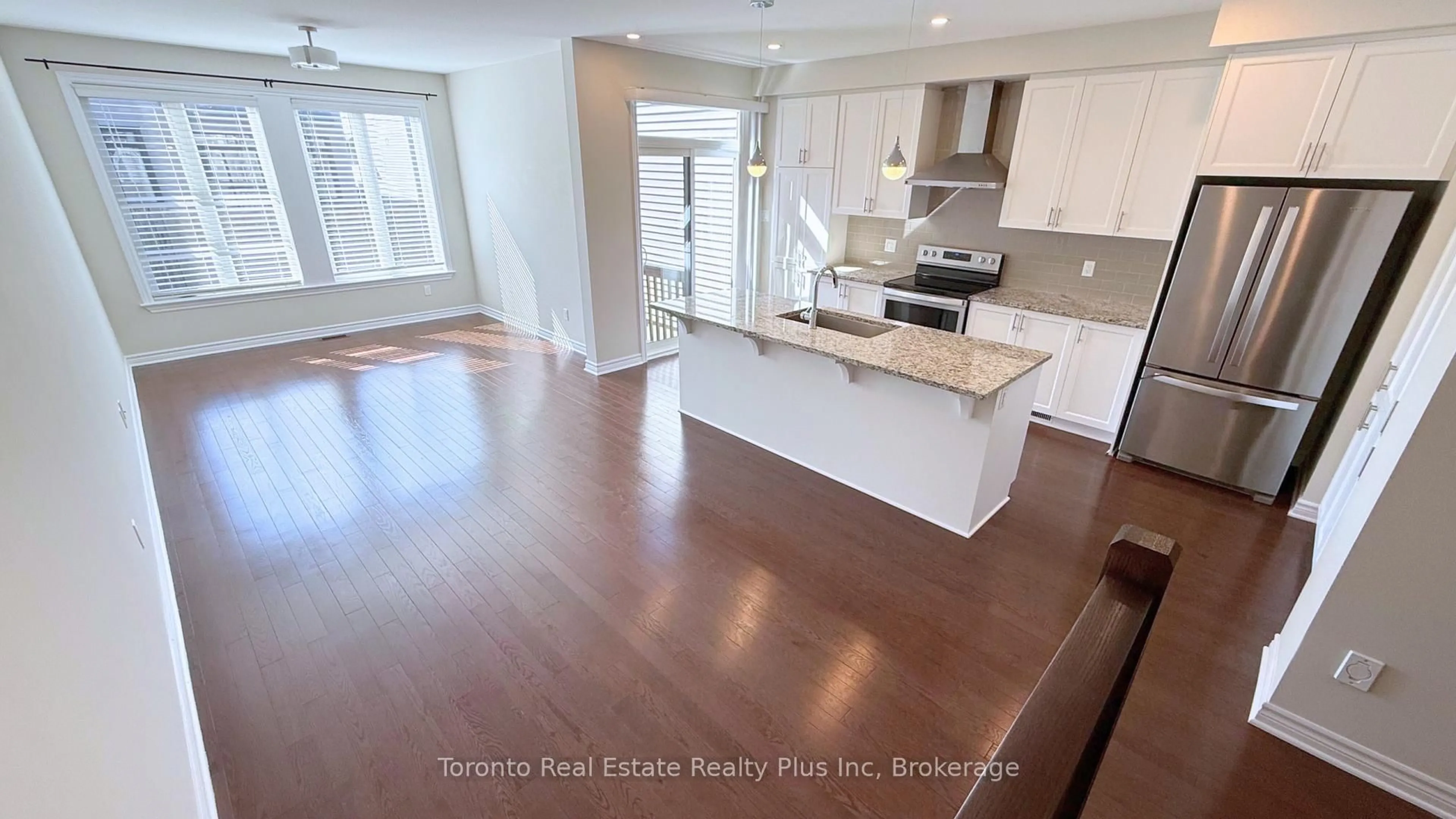 Open concept kitchen, wood/laminate floor for 90 NEPETA Cres, Ottawa Ontario K1T 0S6