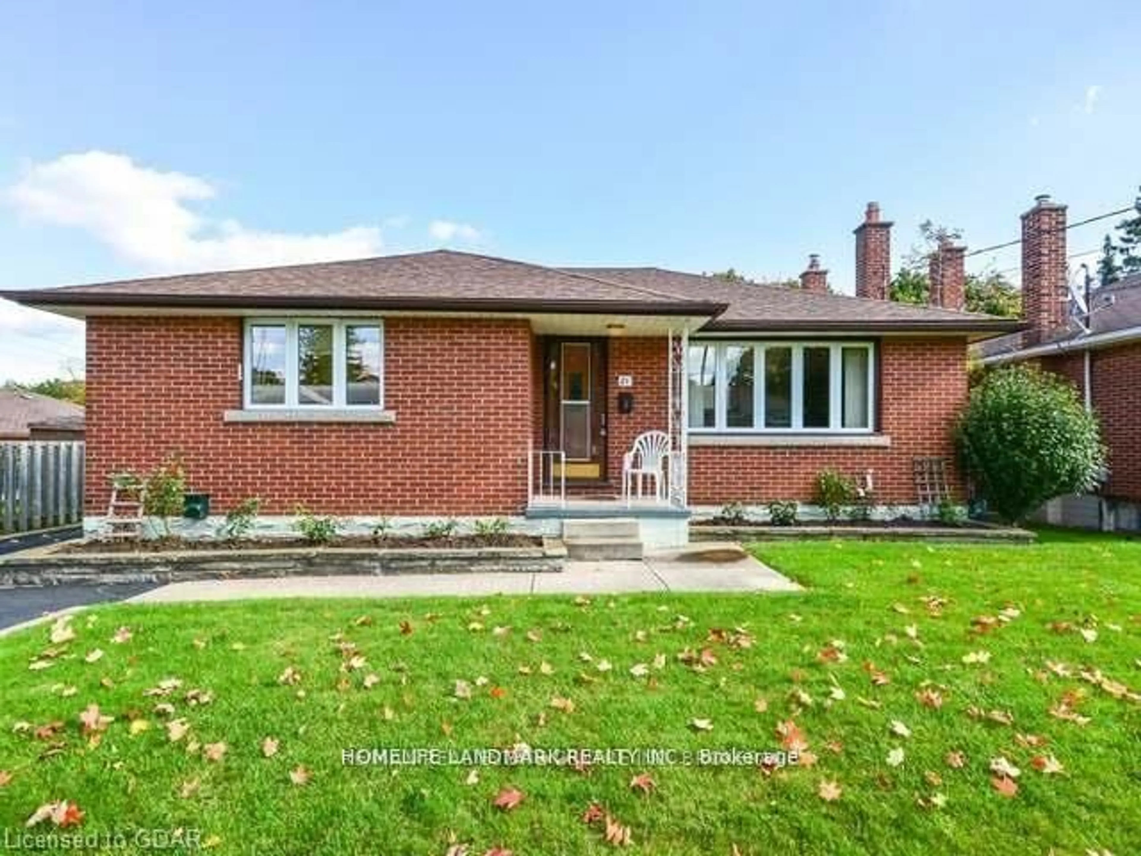 Home with brick exterior material, street for 21 Louisa Dr, Guelph Ontario N1E 4T4