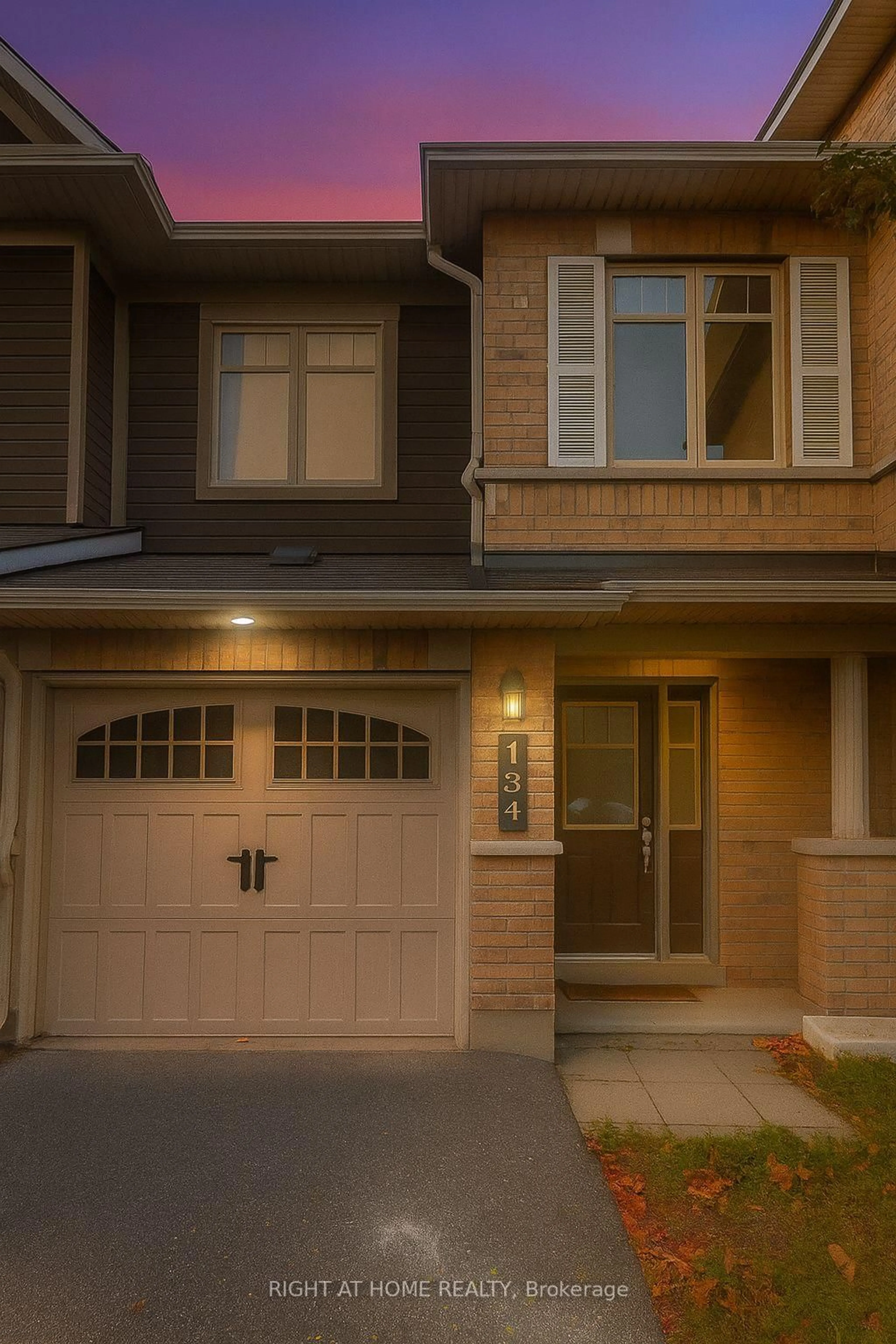 Home with brick exterior material, street for 134 Mancini Way, Ottawa Ontario K2J 3V1