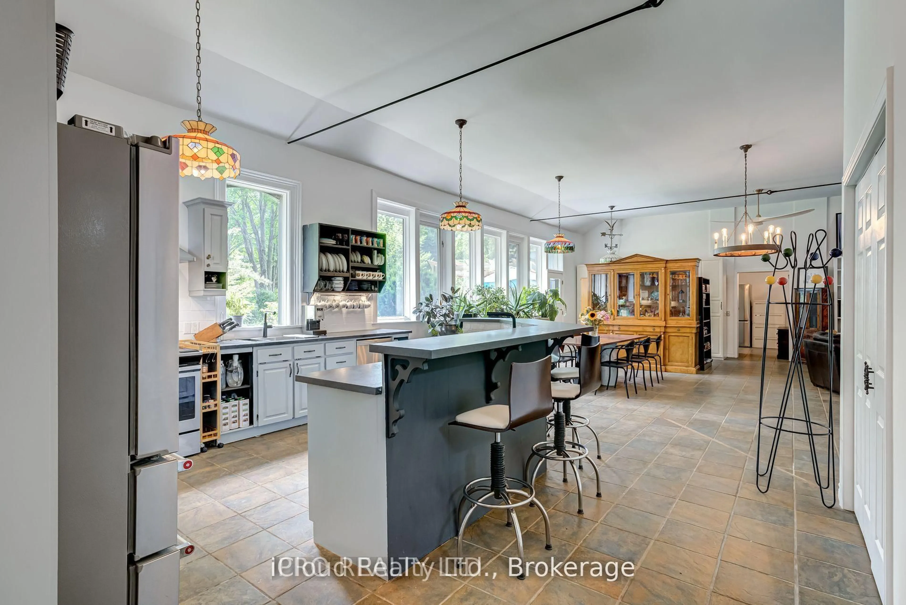 Open concept kitchen, ceramic/tile floor for 715432 1st Line #EHS, Mono Ontario L9A 1A9
