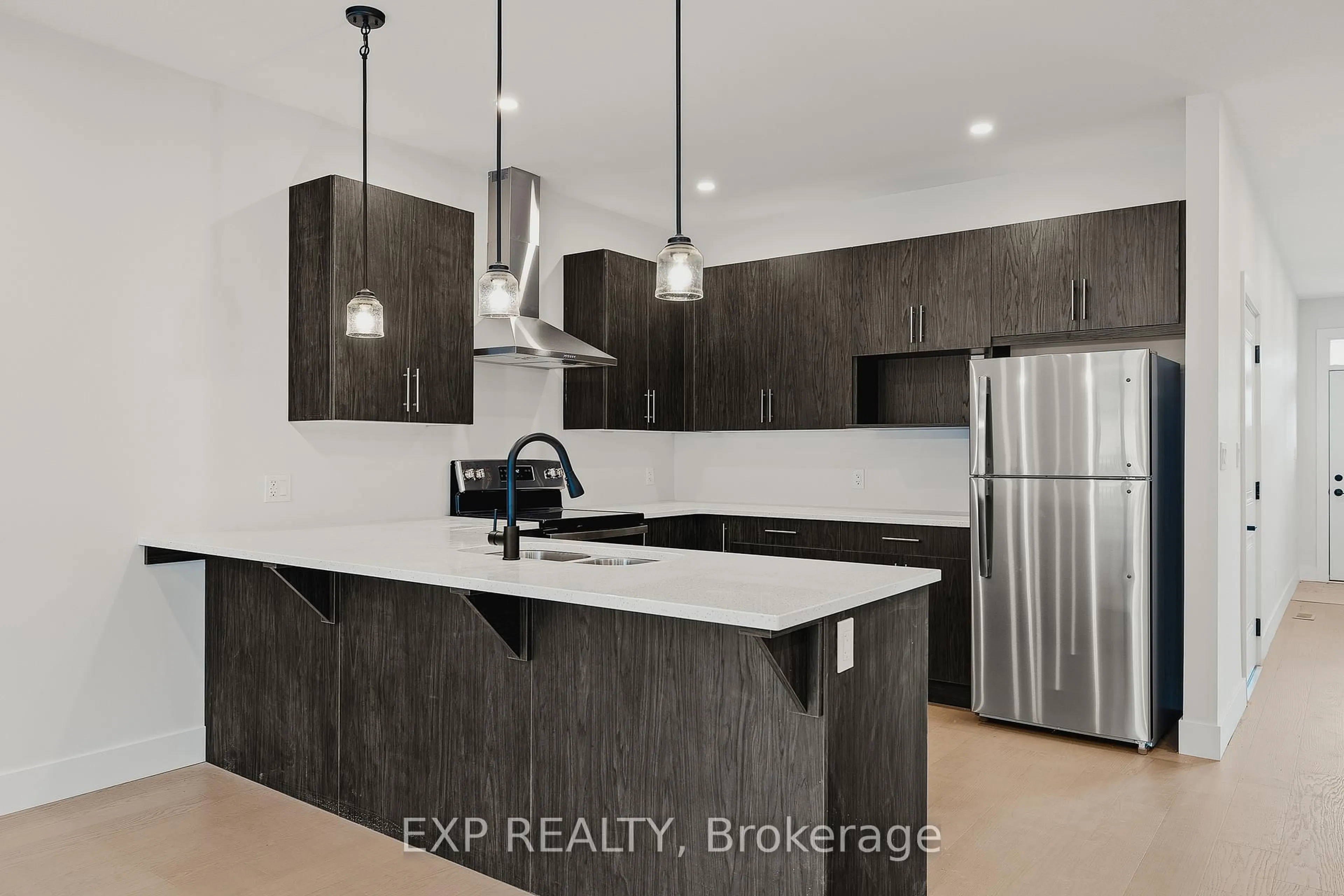 Open concept kitchen, ceramic/tile floor for 12 Washington St #203, Norwich Ontario N0J 1P0