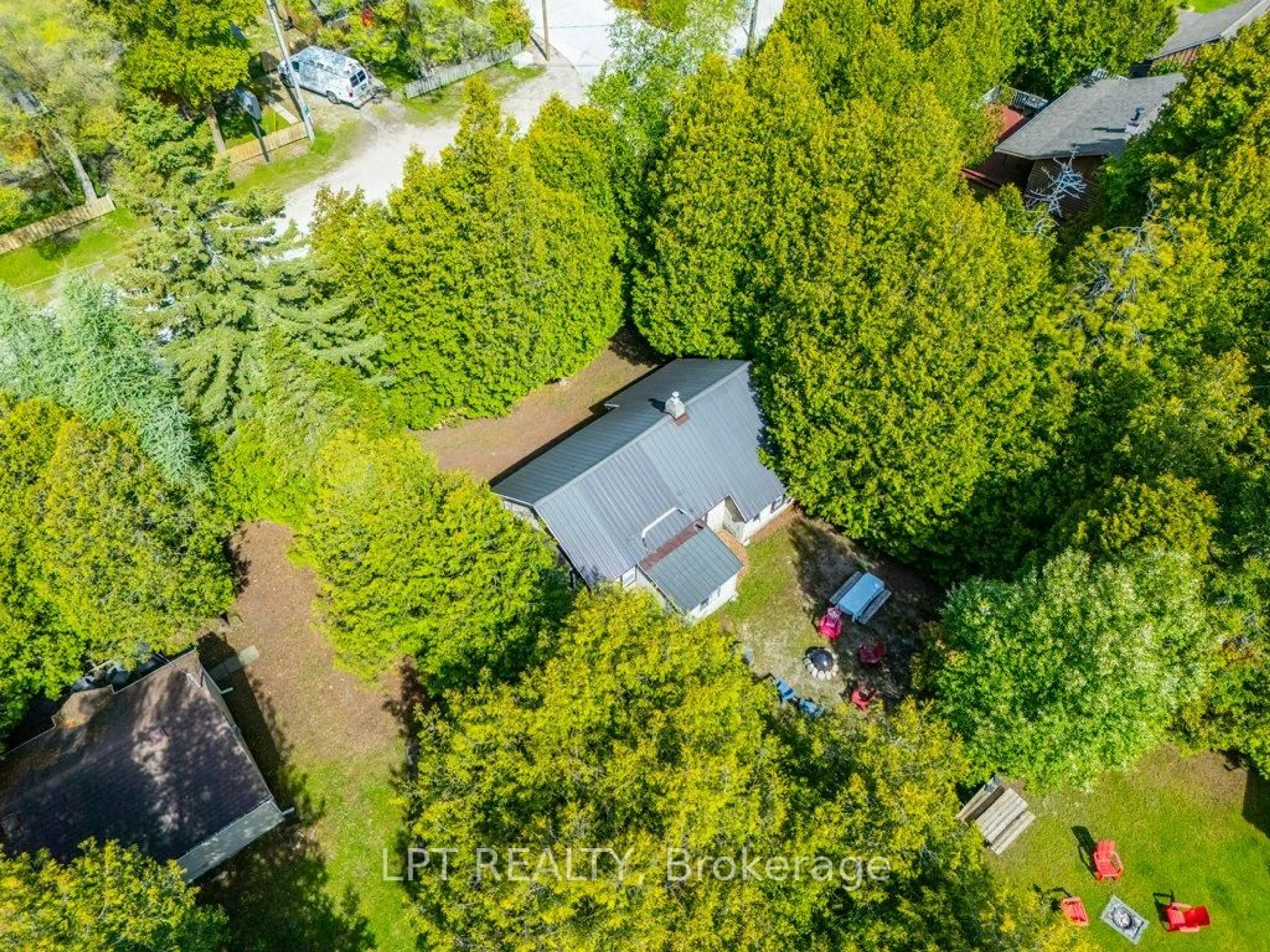 A pic from outside/outdoor area/front of a property/back of a property/a pic from drone, forest/trees view for 117 Second Ave, South Bruce Peninsula Ontario N0H 2G0