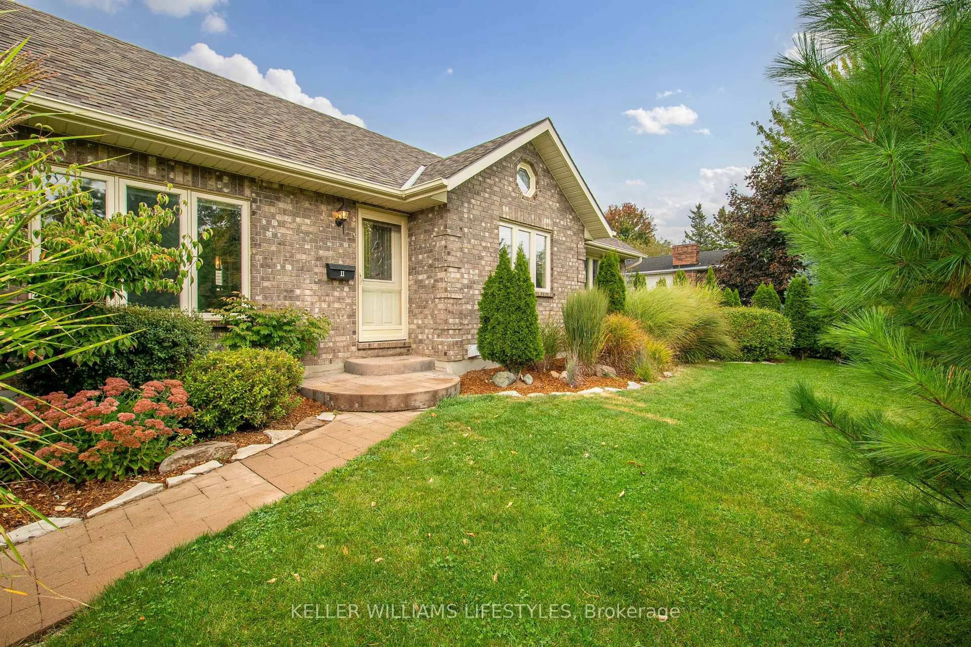 Home with brick exterior material, street for 11 Eureka St, Lambton Shores Ontario N0N 1J0