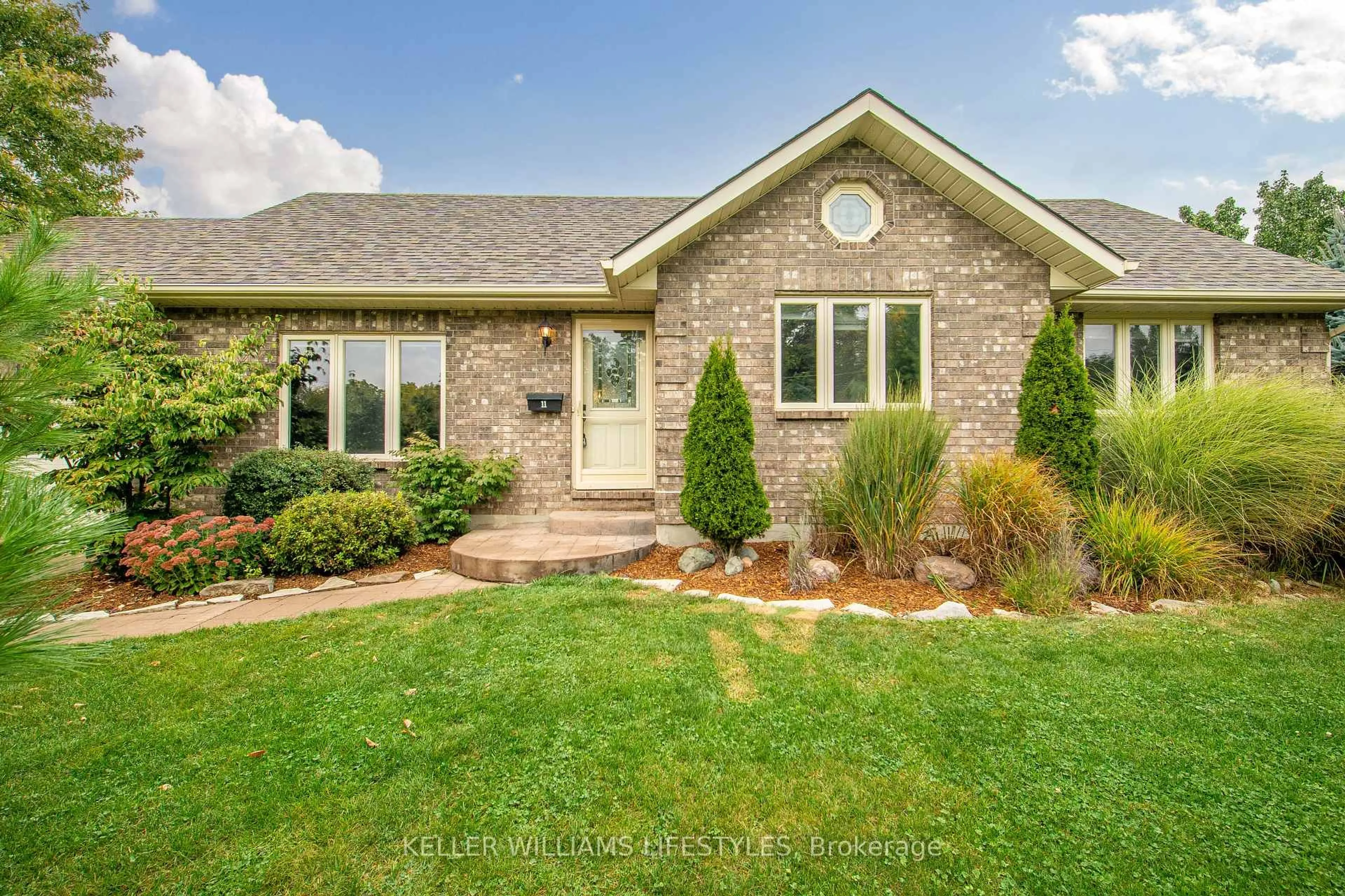 Home with brick exterior material, street for 11 Eureka St, Lambton Shores Ontario N0N 1J0