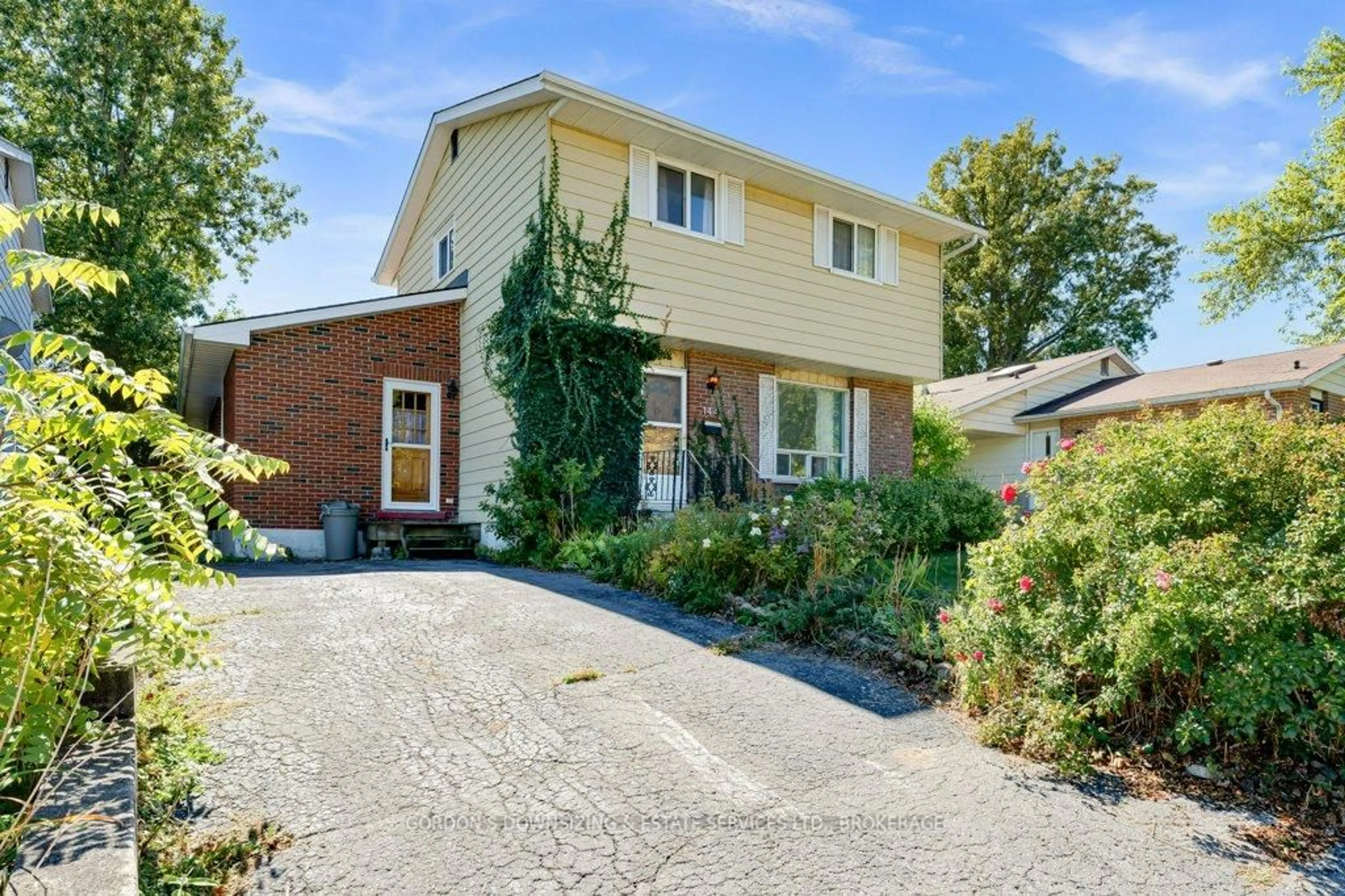 Home with brick exterior material, street for 144 Calderwood Dr, Kingston Ontario K7M 6M3