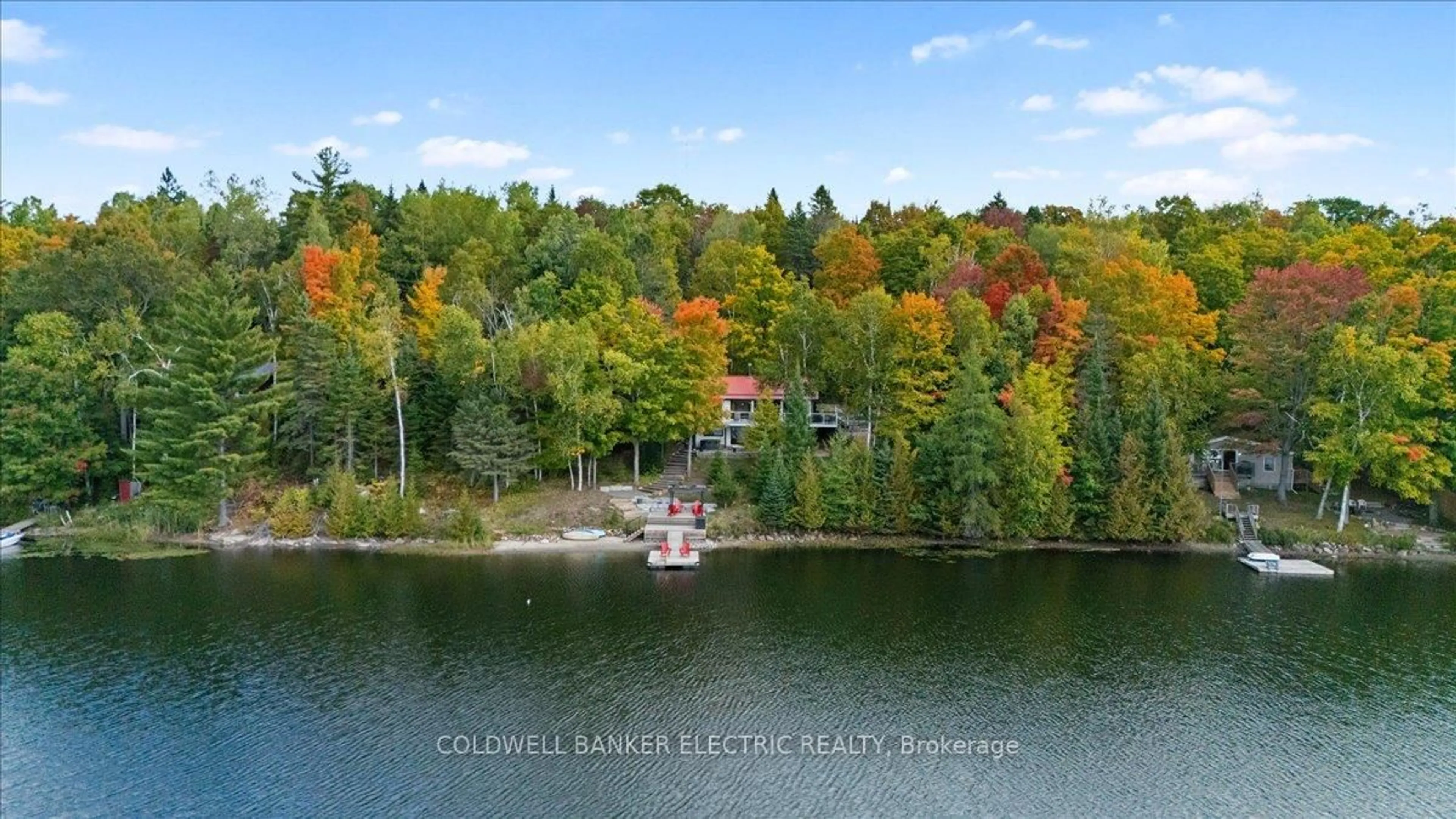 A pic from outside/outdoor area/front of a property/back of a property/a pic from drone, water/lake/river/ocean view for 37 Fire Route 296, Trent Lakes Ontario K0L 1J0