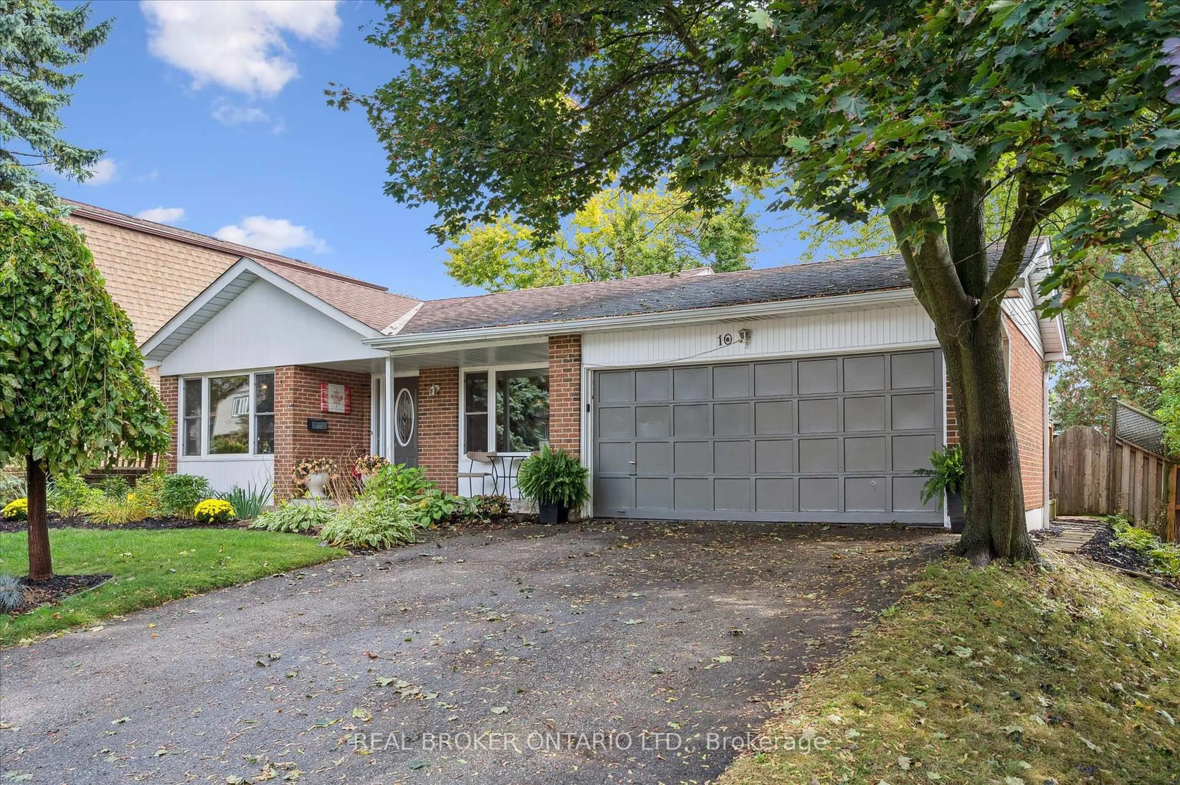 Home with brick exterior material, street for 10 Northwood Cres, Guelph Ontario N1H 6Z4