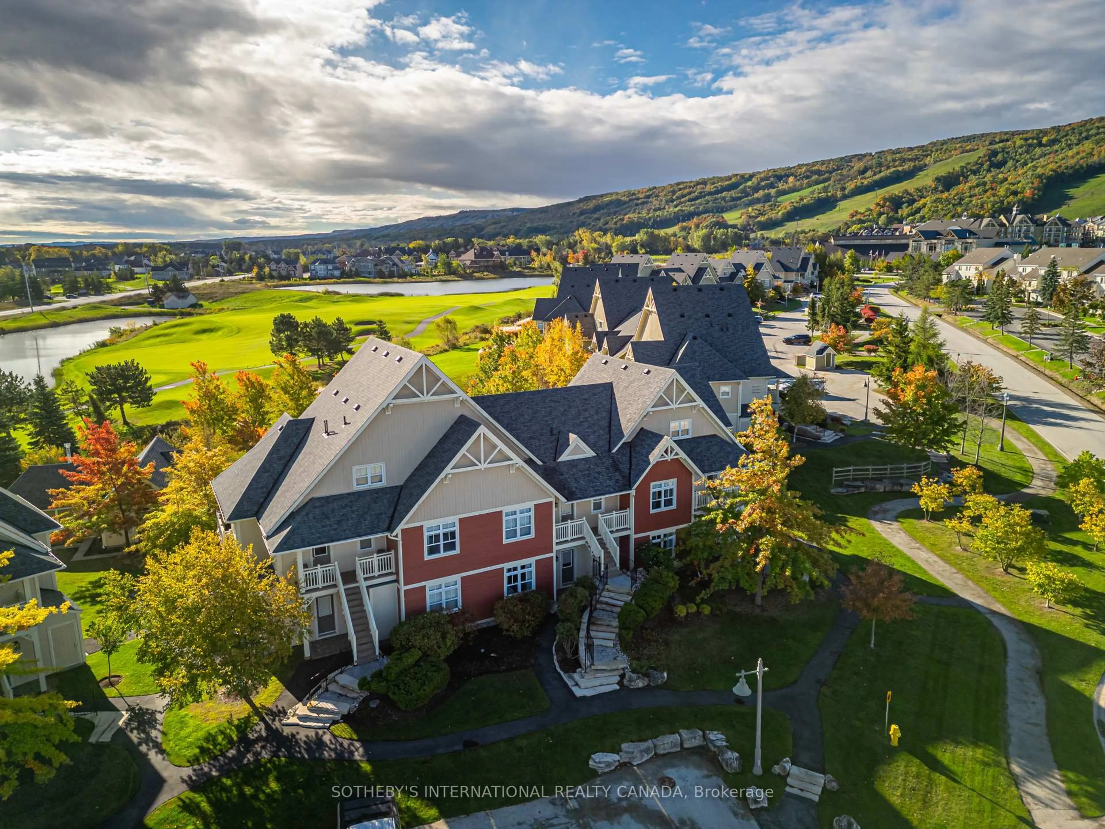 A pic from outside/outdoor area/front of a property/back of a property/a pic from drone, mountain view for 125 Fairway Crt #120, Blue Mountains Ontario L9Y 0P8