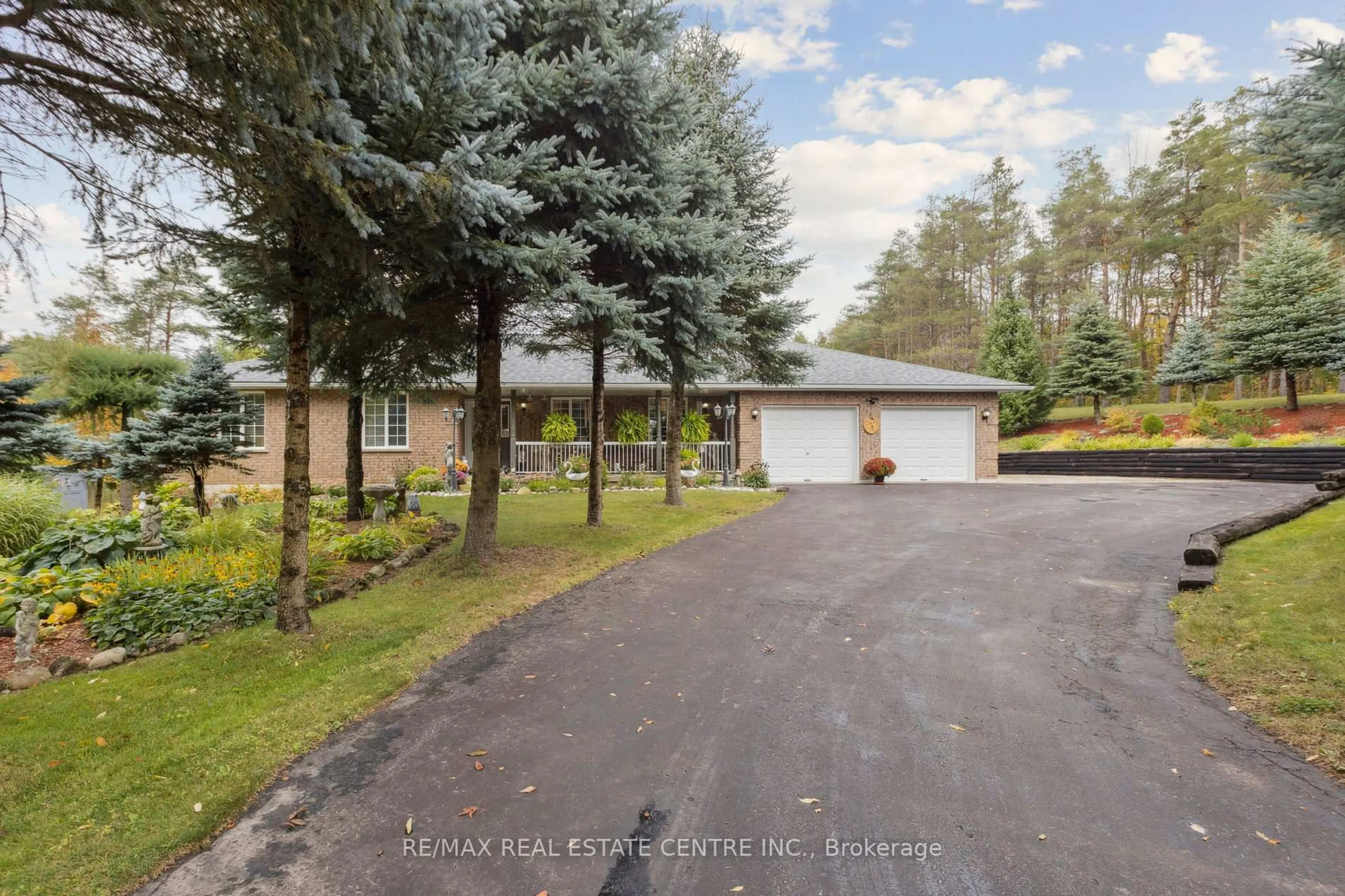 A pic from outside/outdoor area/front of a property/back of a property/a pic from drone, street for 122769 GREY ROAD 9, West Grey Ontario N0G 1C0