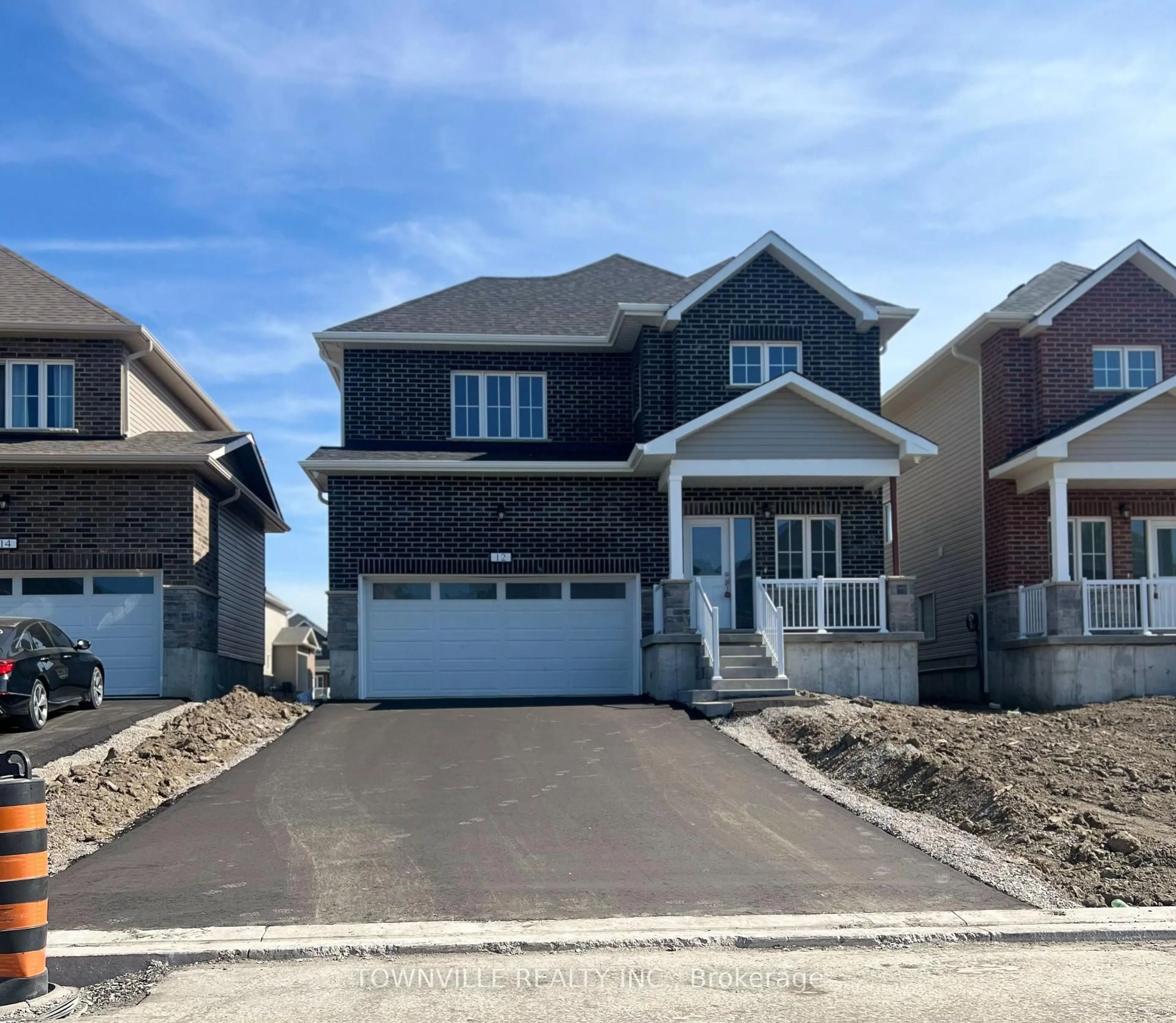 Home with vinyl exterior material, street for 12 Bradden Cres, Belleville Ontario K8N 0T8