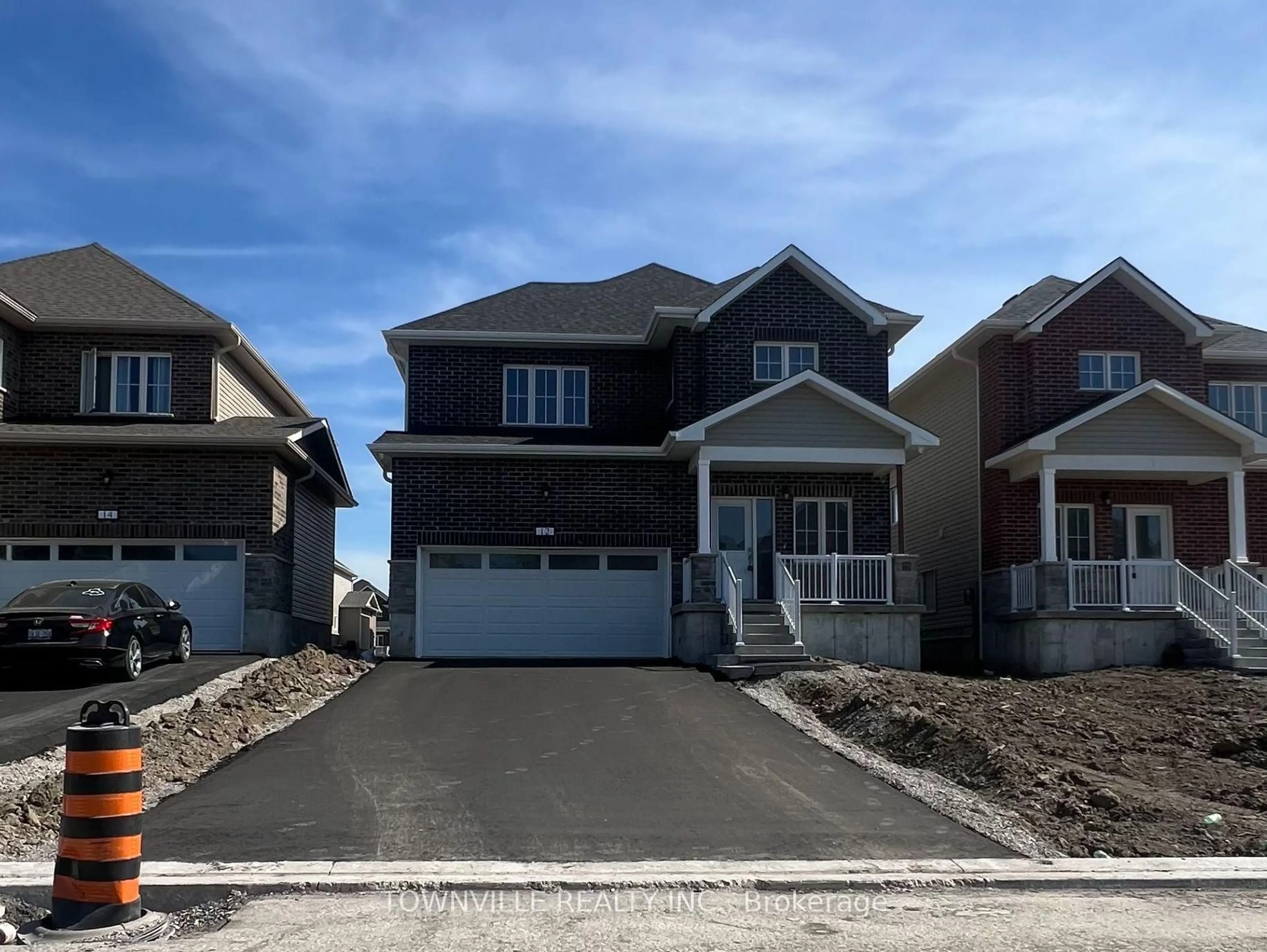 Home with vinyl exterior material, street for 12 Bradden Cres, Belleville Ontario K8N 0T8
