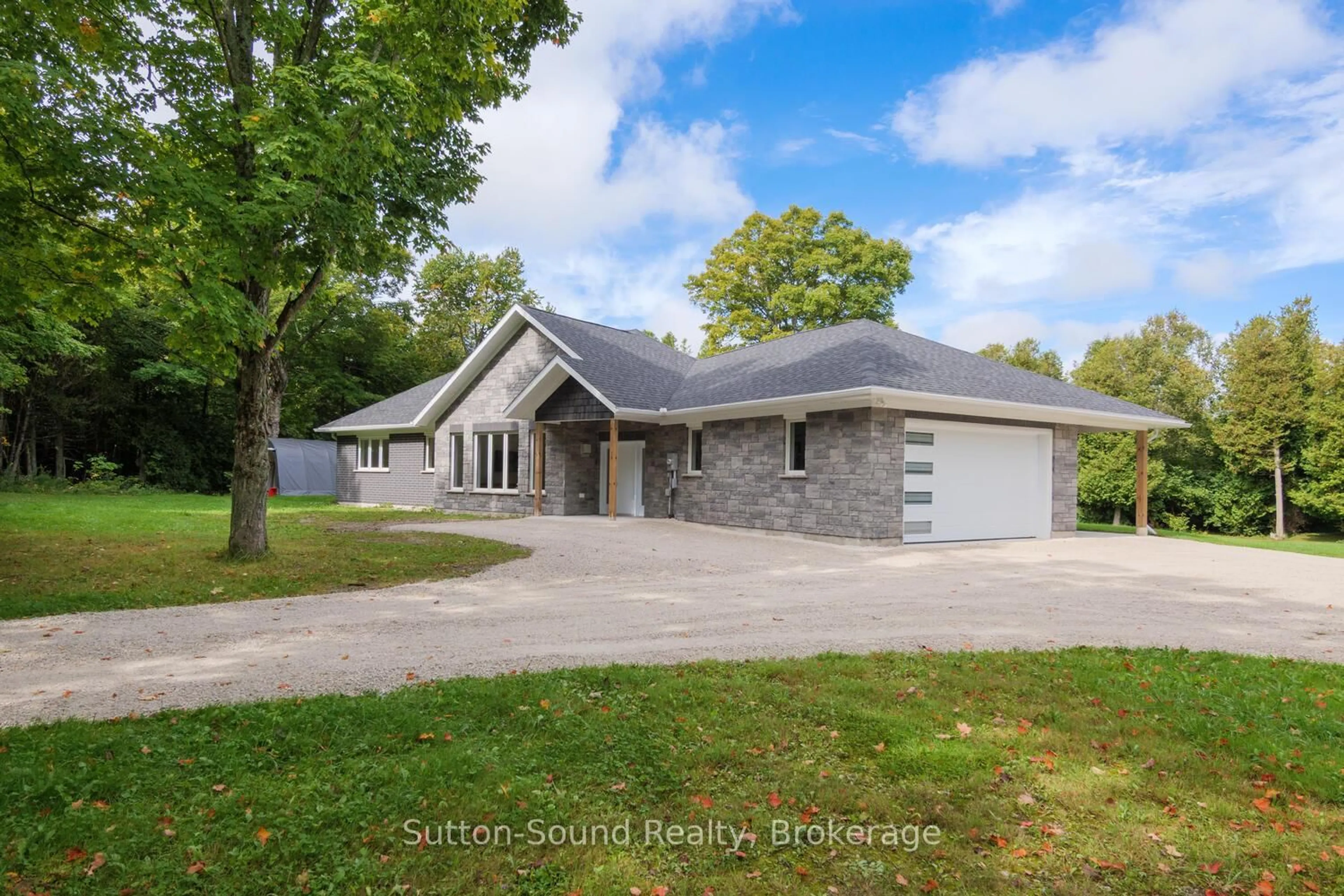 A pic from outside/outdoor area/front of a property/back of a property/a pic from drone, street for 293 Everatt Sdrd, Northern Bruce Peninsula Ontario N0H 1W0