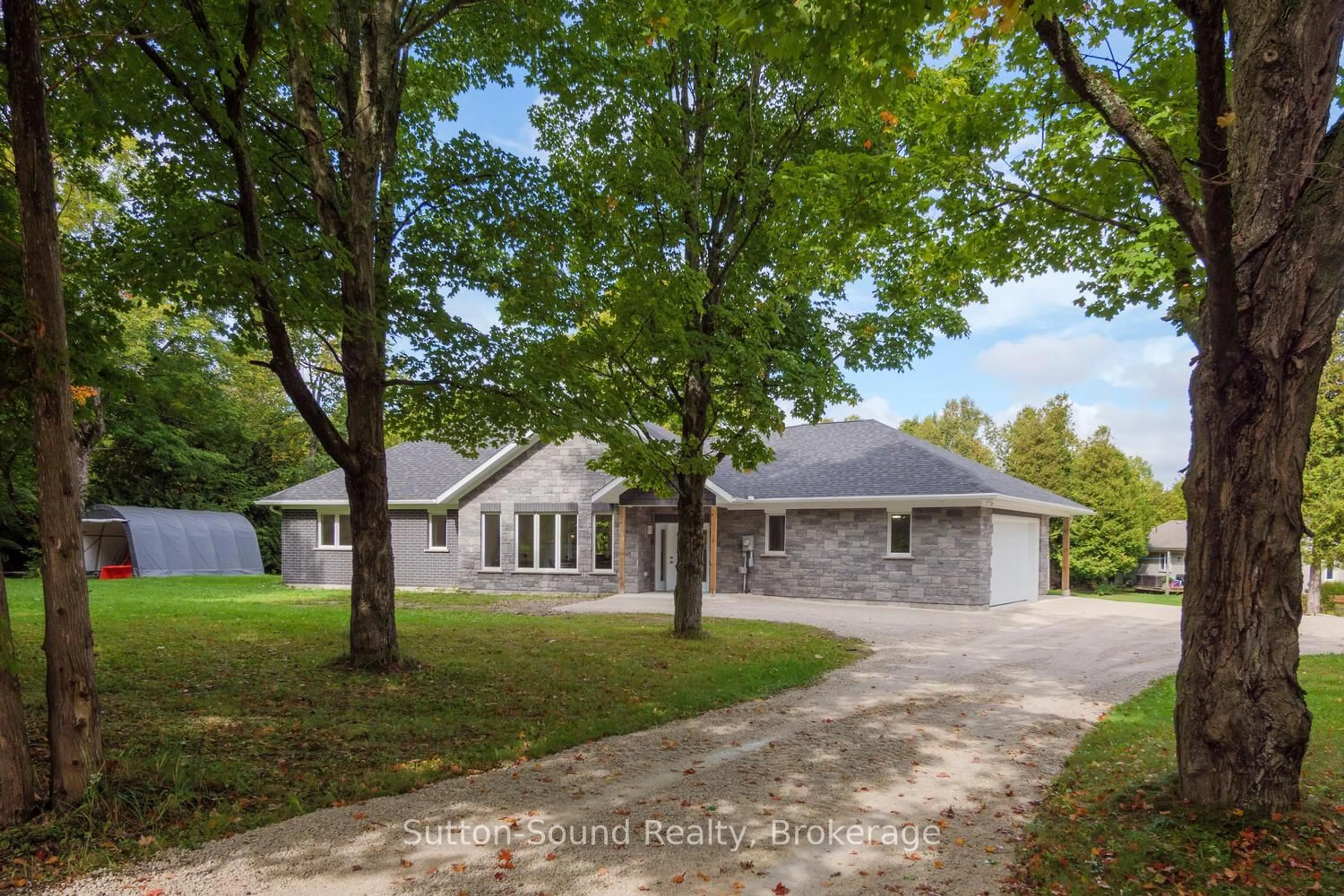 Home with brick exterior material, street for 293 Everatt Sdrd, Northern Bruce Peninsula Ontario N0H 1W0