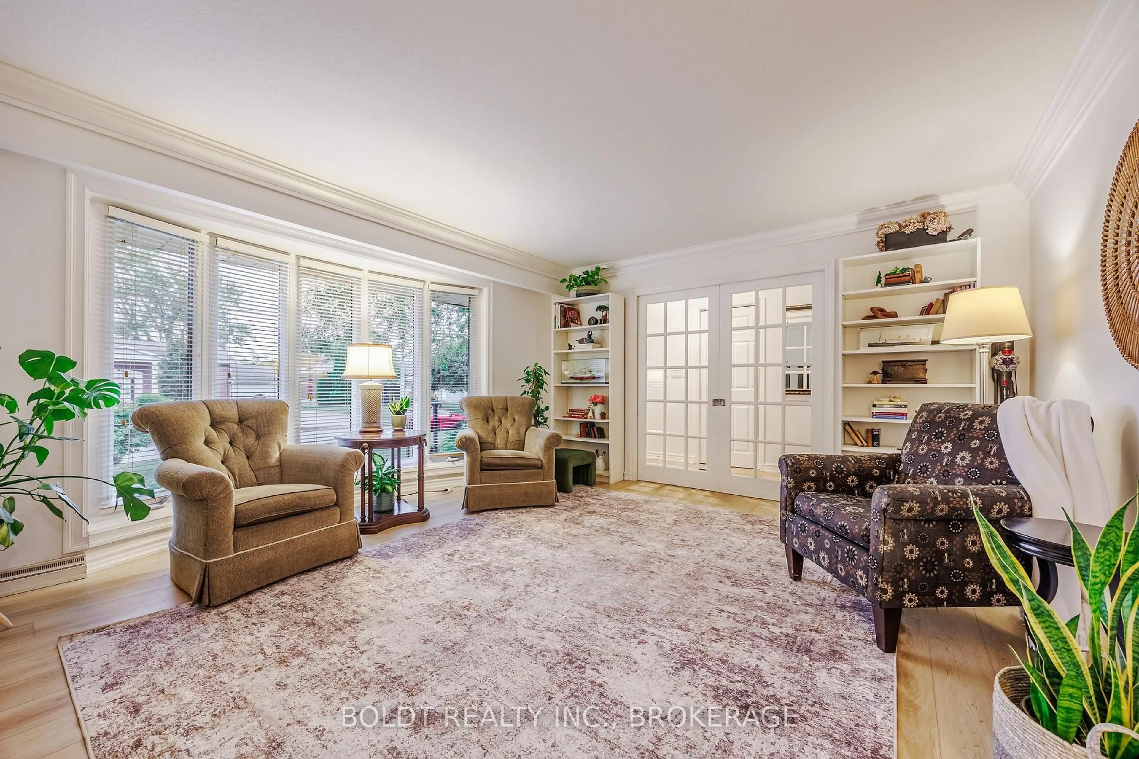 Living room with furniture, carpet floor for 25 Neptune Dr, St. Catharines Ontario L2M 2S3