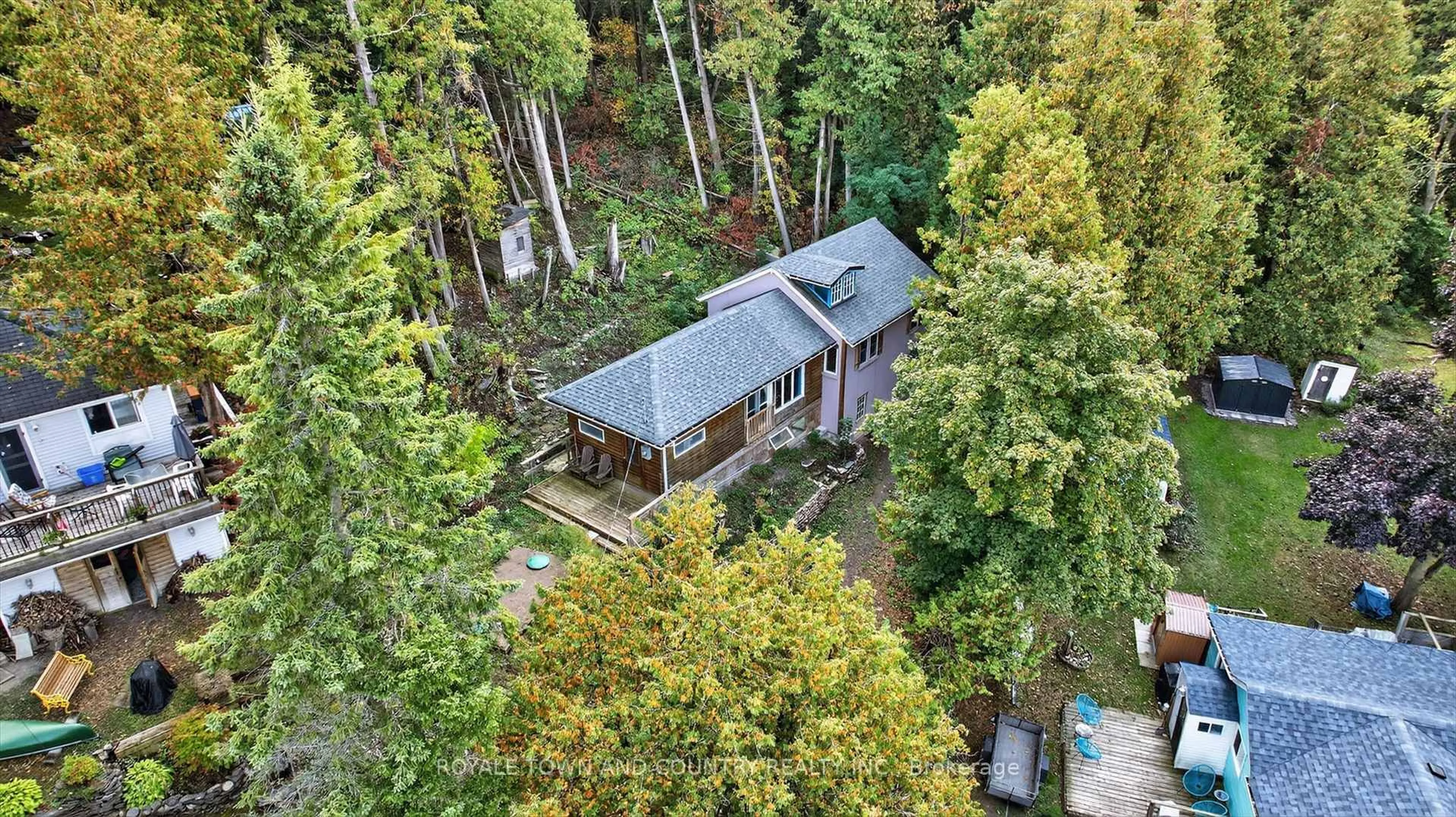 A pic from outside/outdoor area/front of a property/back of a property/a pic from drone, forest/trees view for 60 Elder St, Kawartha Lakes Ontario K0M 1L0